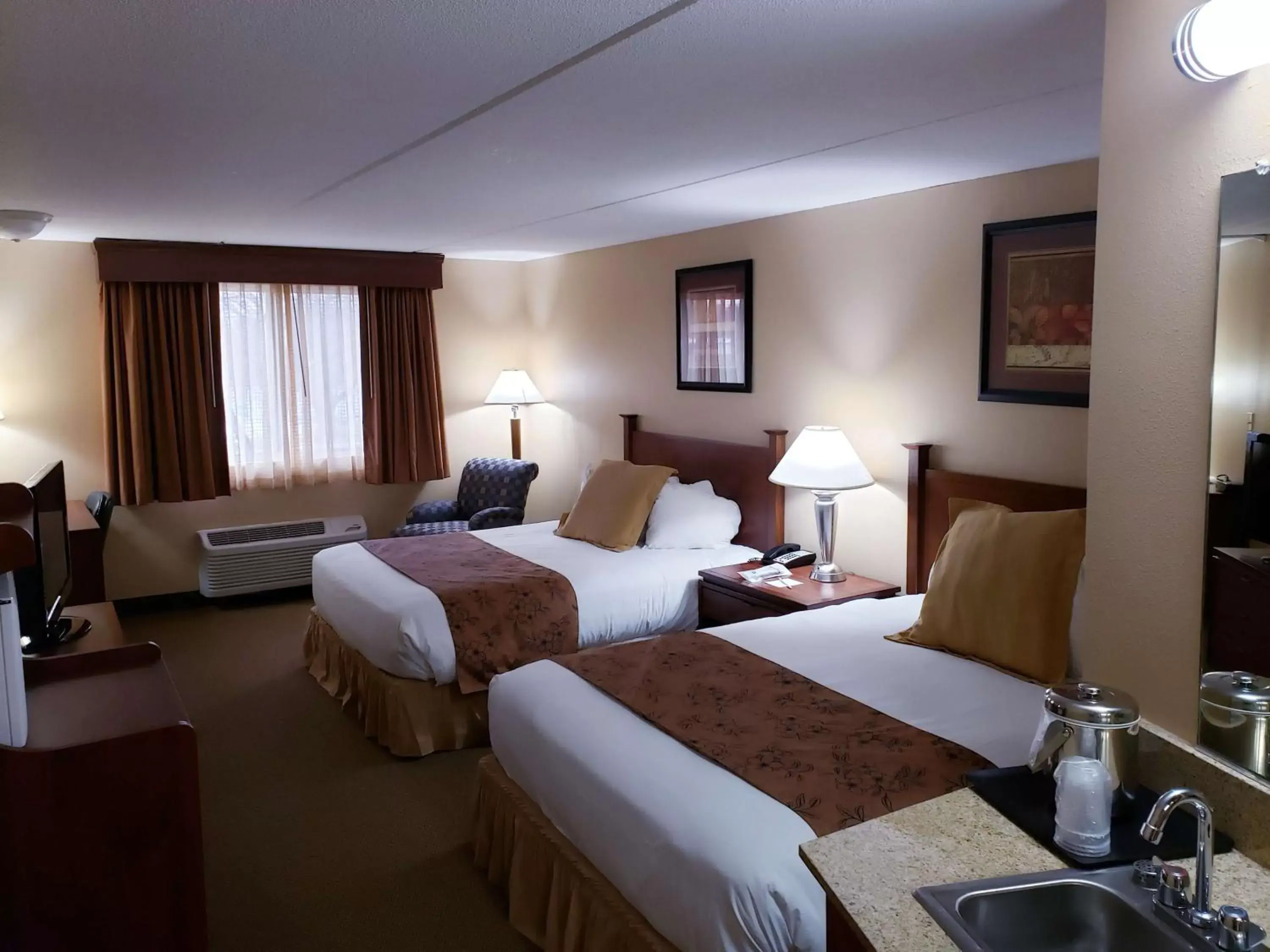 Photo of the whole room, Bed in SureStay Plus Hotel by Best Western Black River Falls
