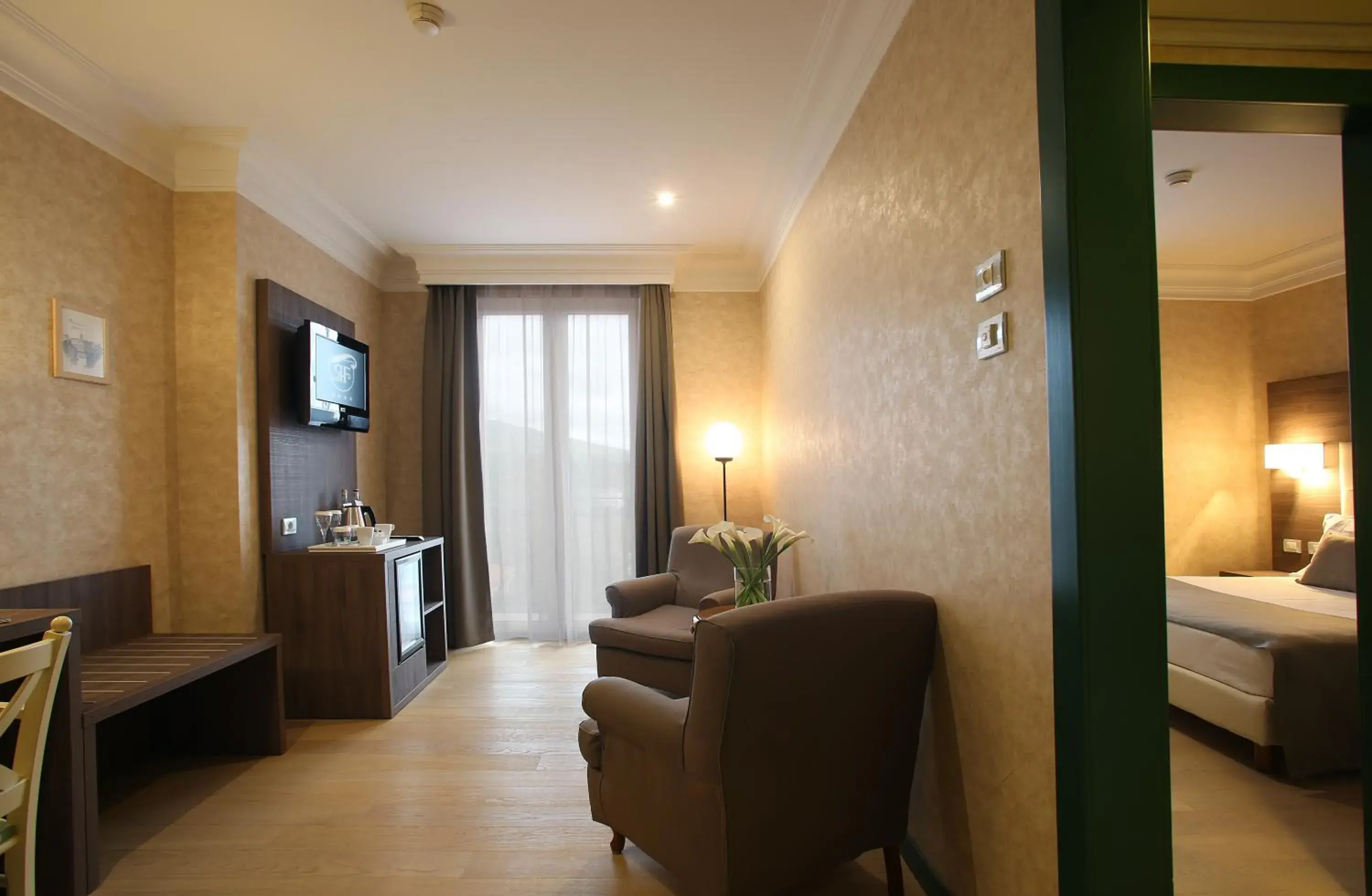 Bedroom, Seating Area in Relais La Fattoria