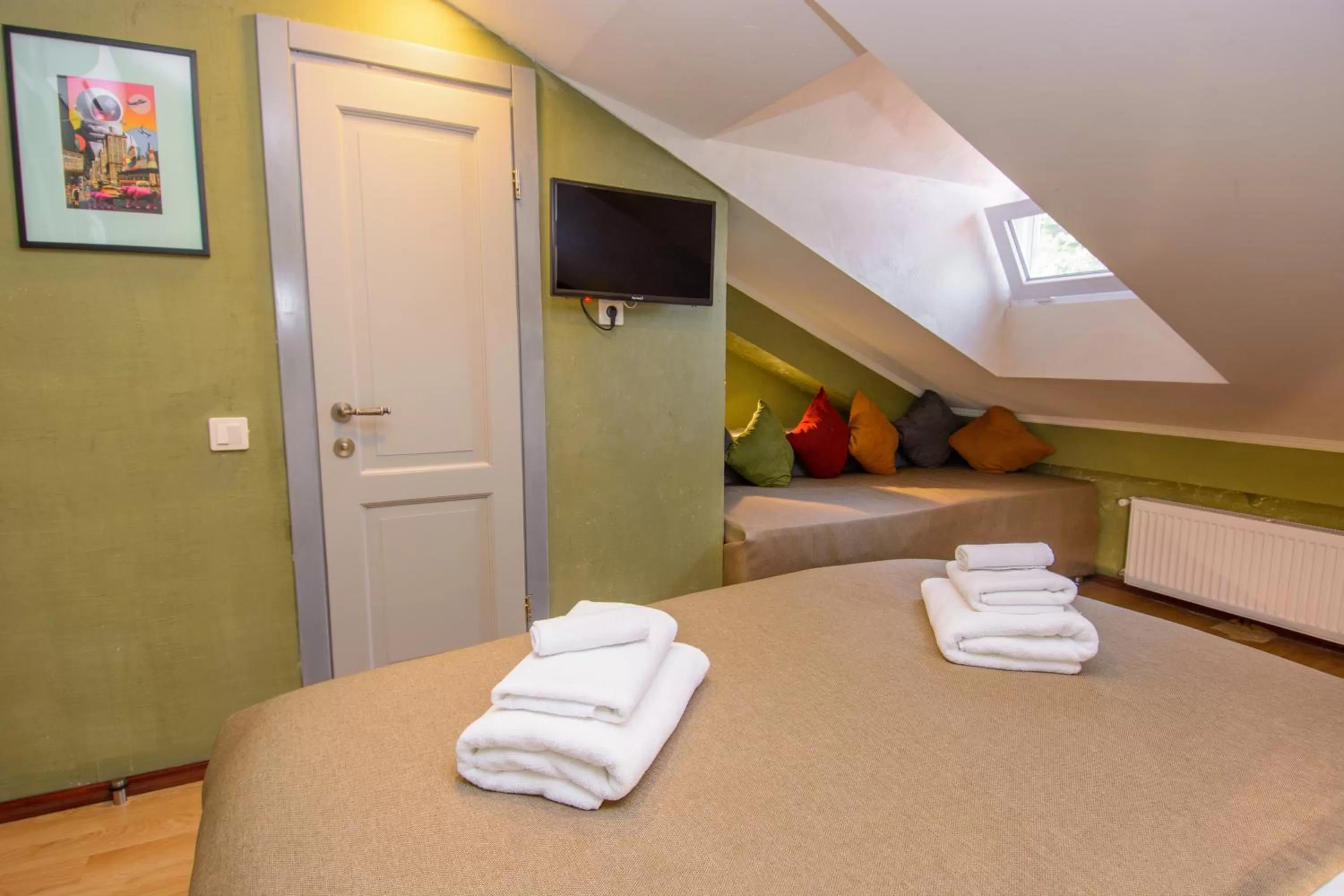 Bed in Kindli Boutique Hotel