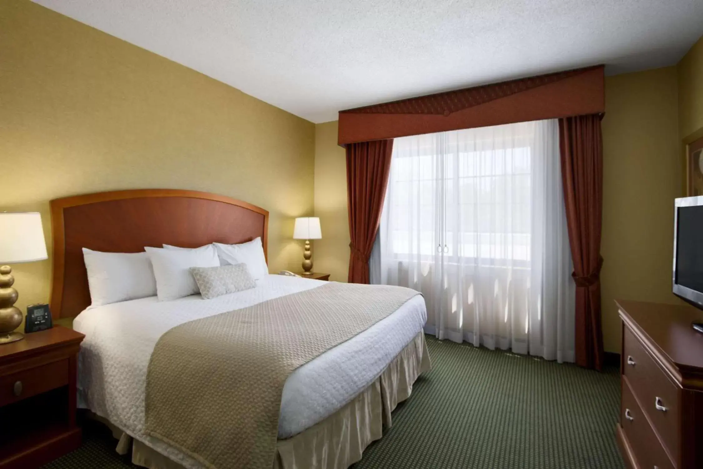 Bed in Embassy Suites by Hilton Greensboro Airport