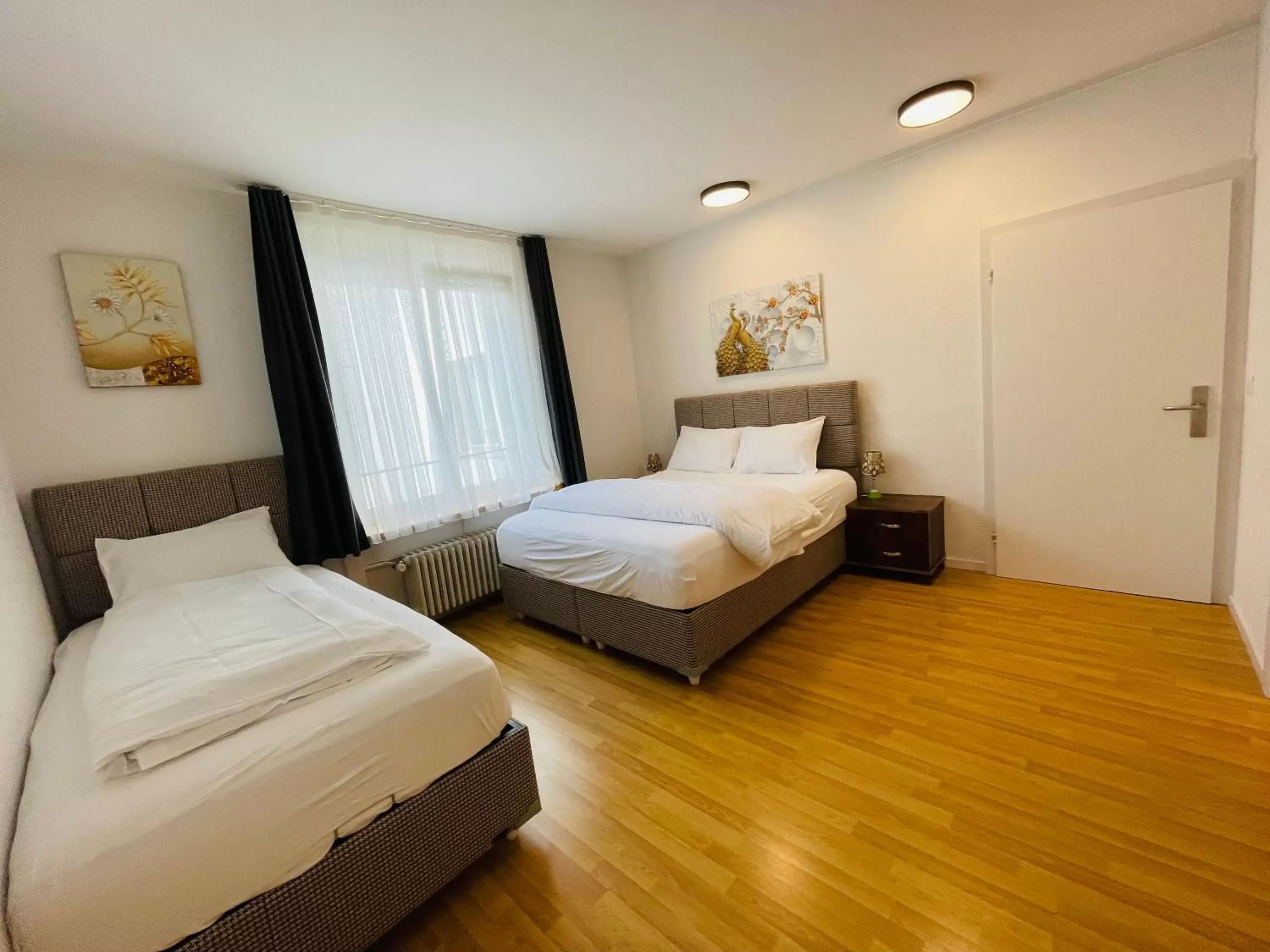 Triple Room in Akomo Bern Triple Room in Akomo Bern