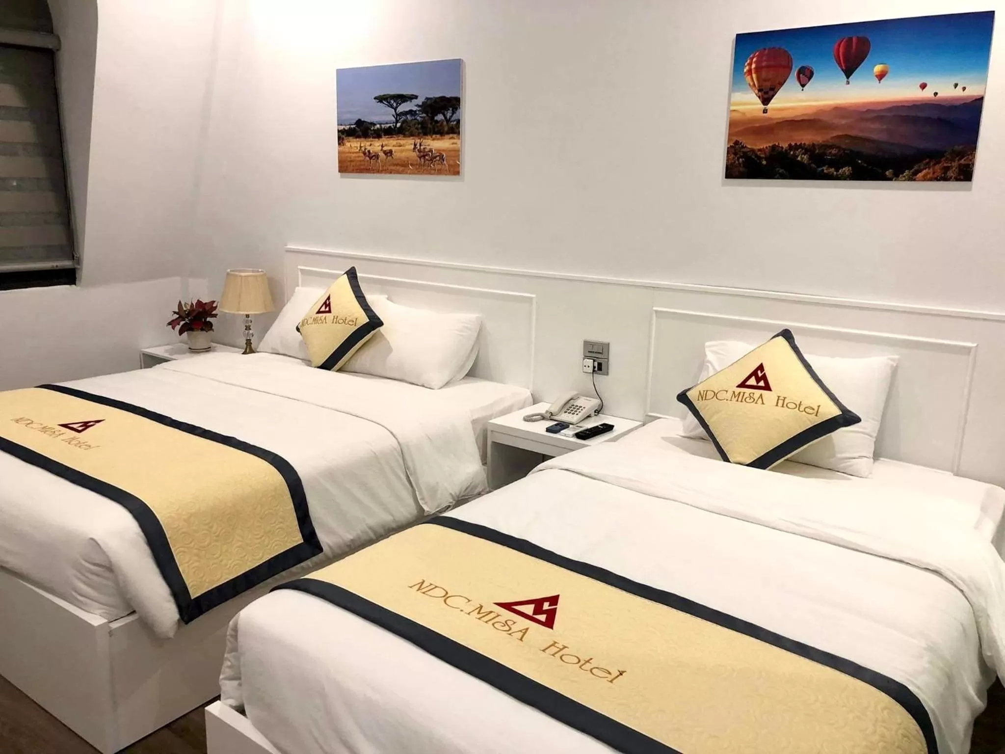 Bed in NDC MISA HOTEL