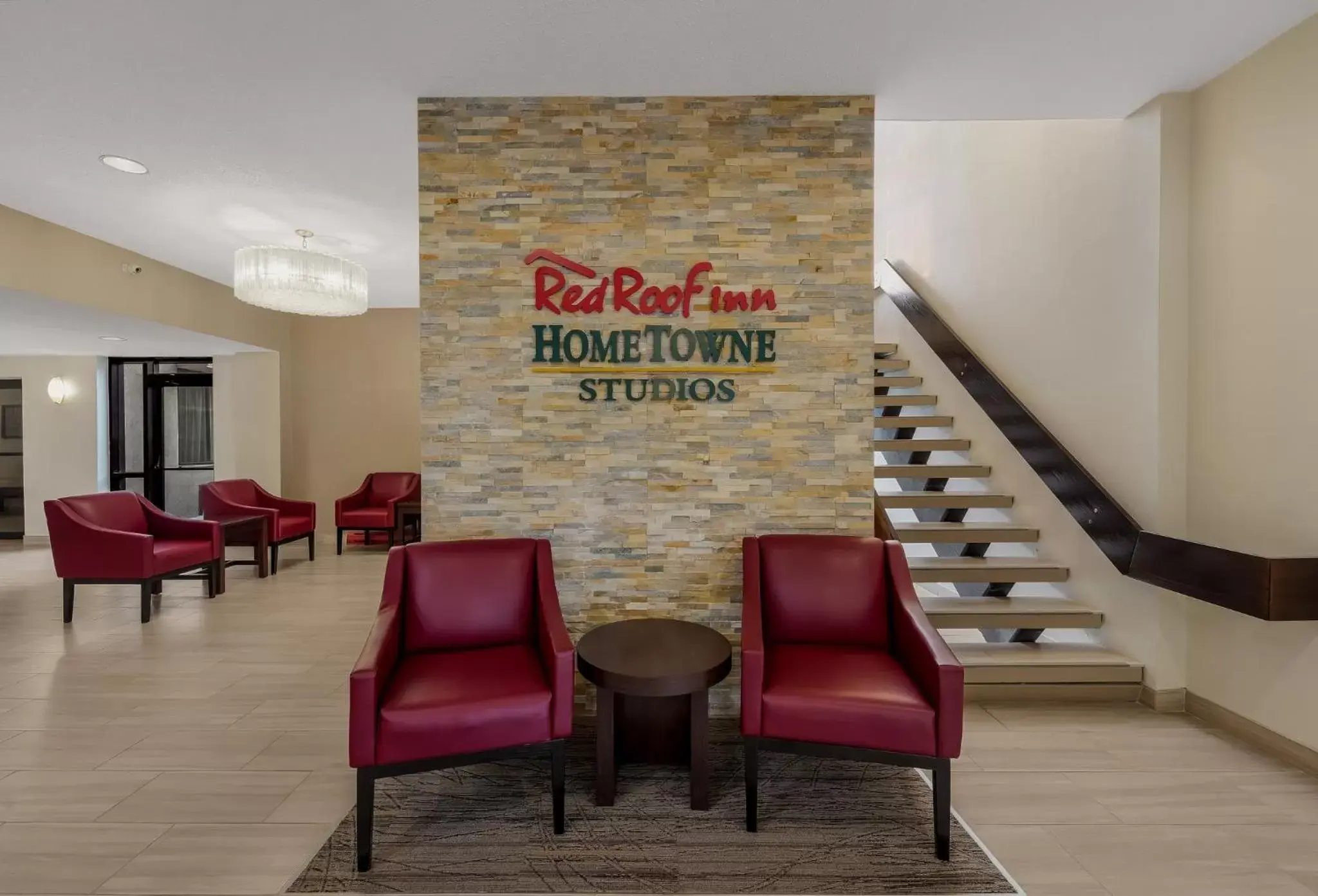 Lobby or reception, Lobby/Reception in HomeTowne Studios by Red Roof Painted Post
