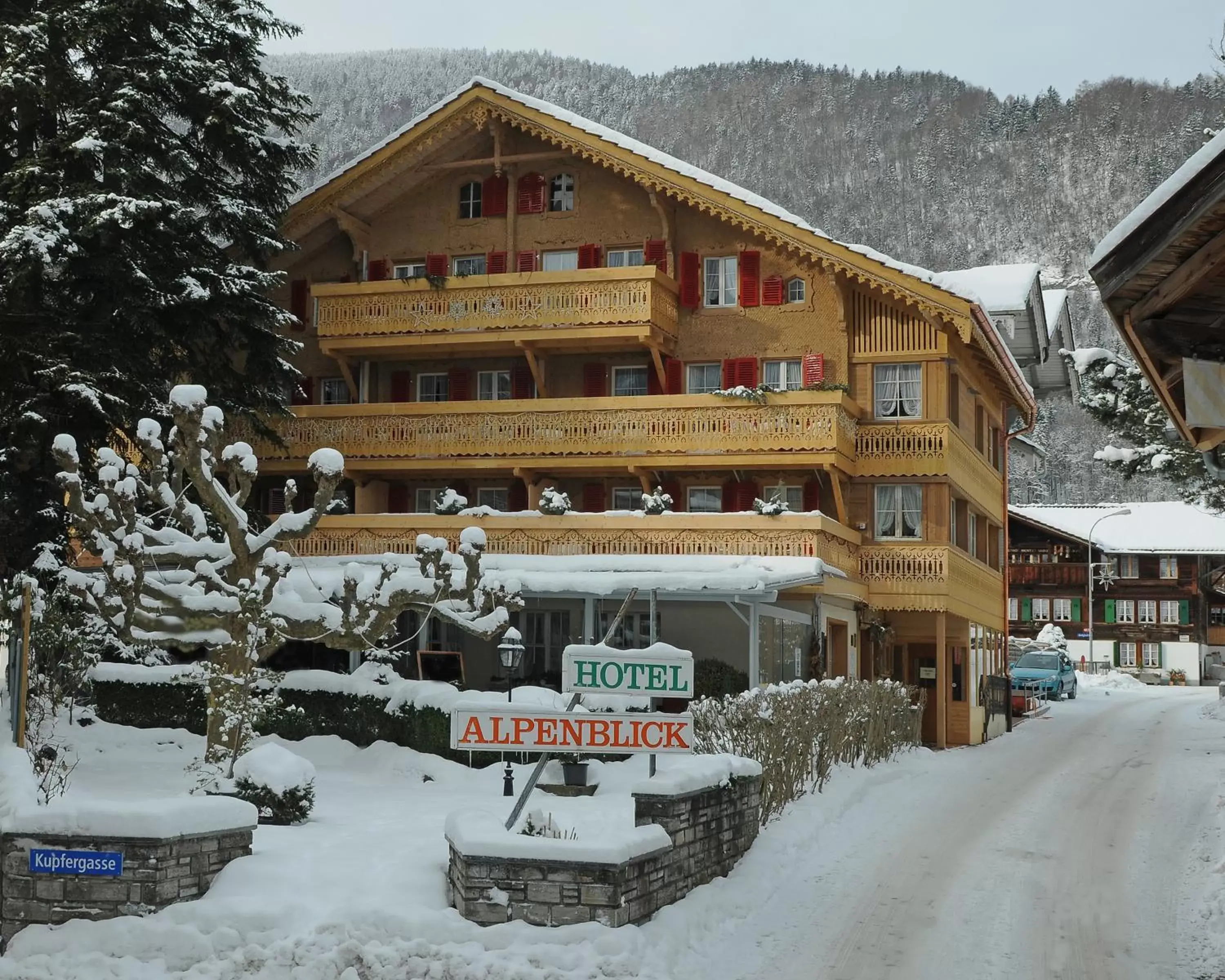 Facade/entrance, Winter in Alpenblick Hotel & Restaurant Wilderswil by Interlaken