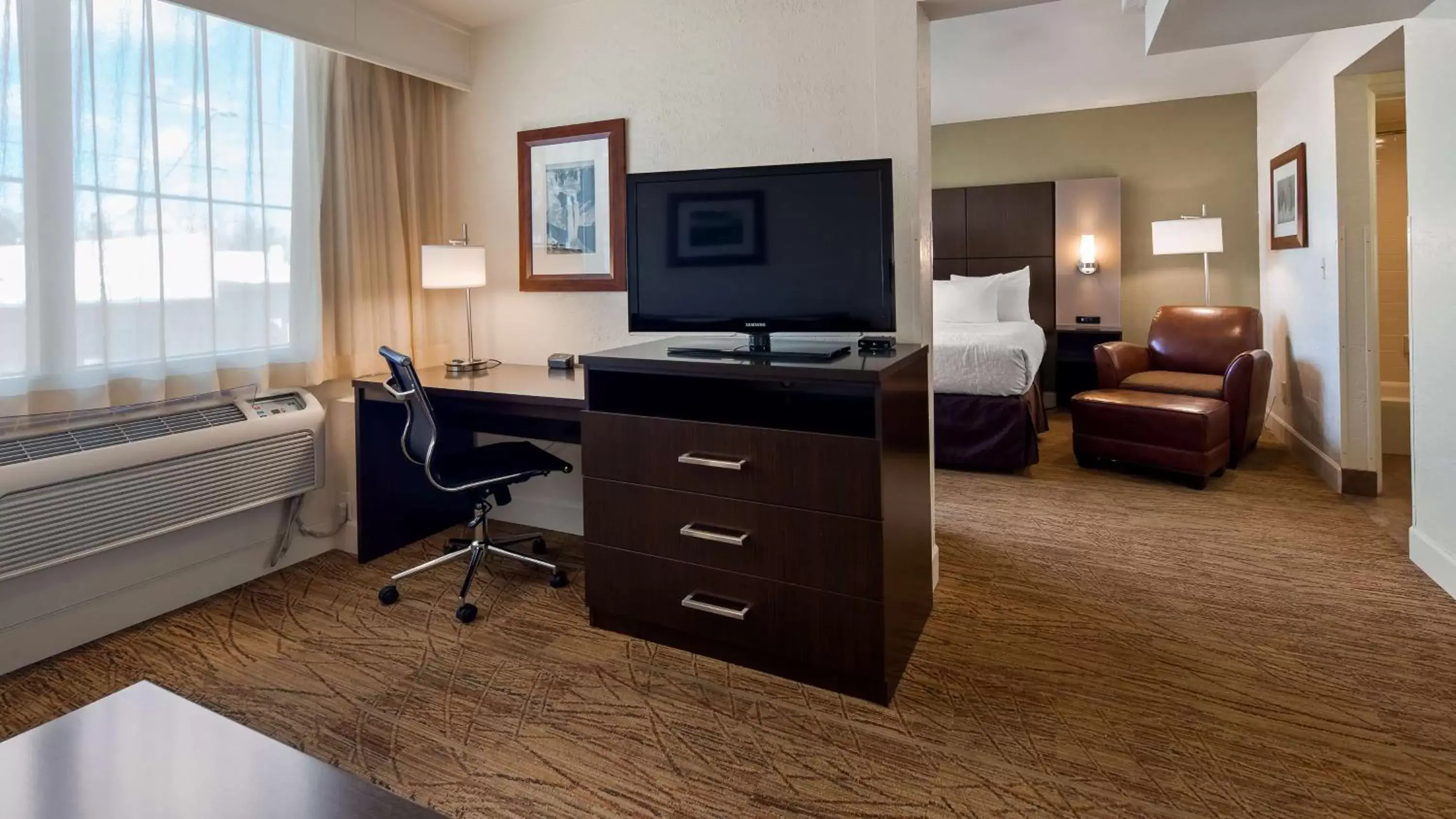 Photo of the whole room, TV/Entertainment Center in Best Western Pony Soldier Inn & Suites