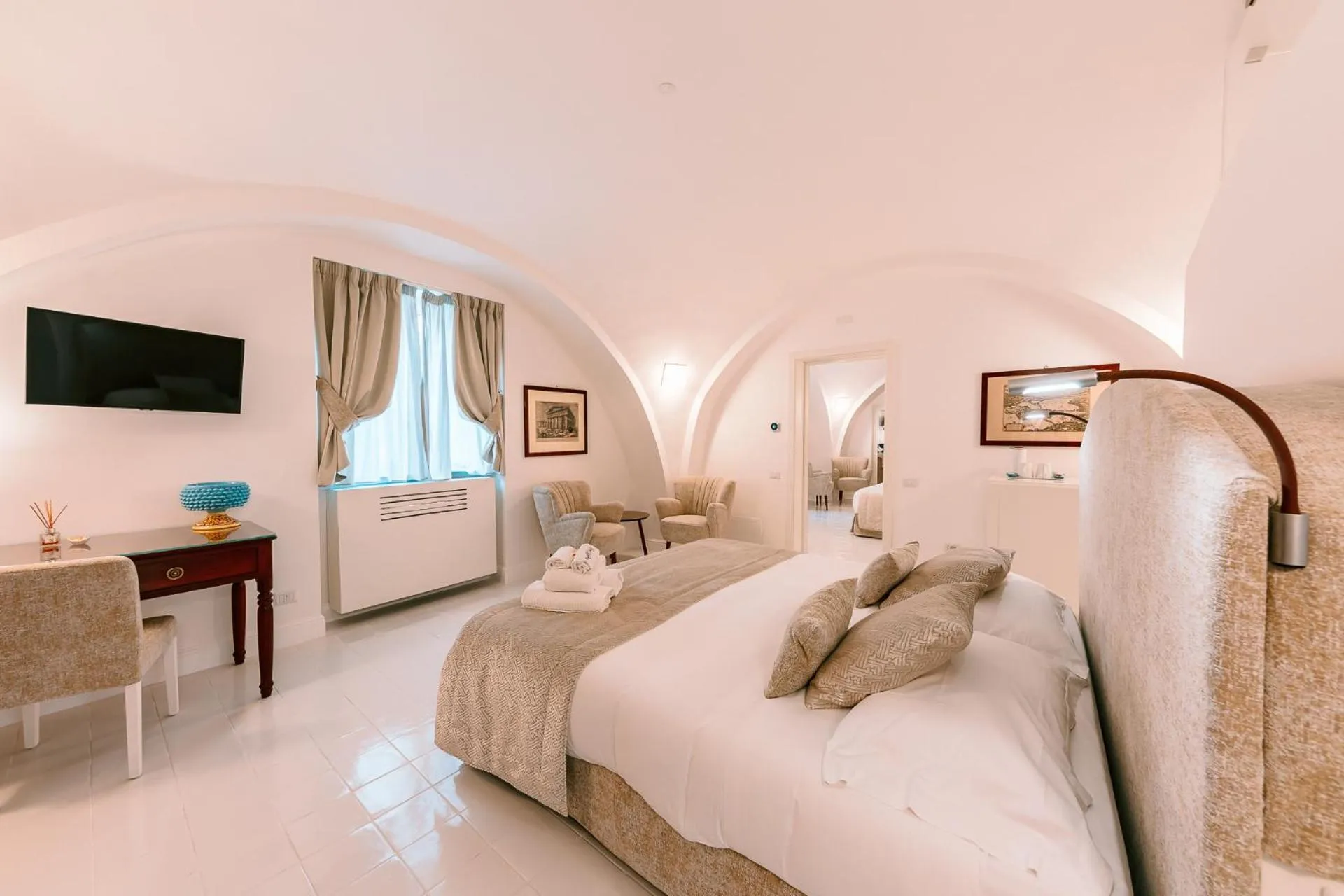 Bed in Antica Rheginna Luxury Room