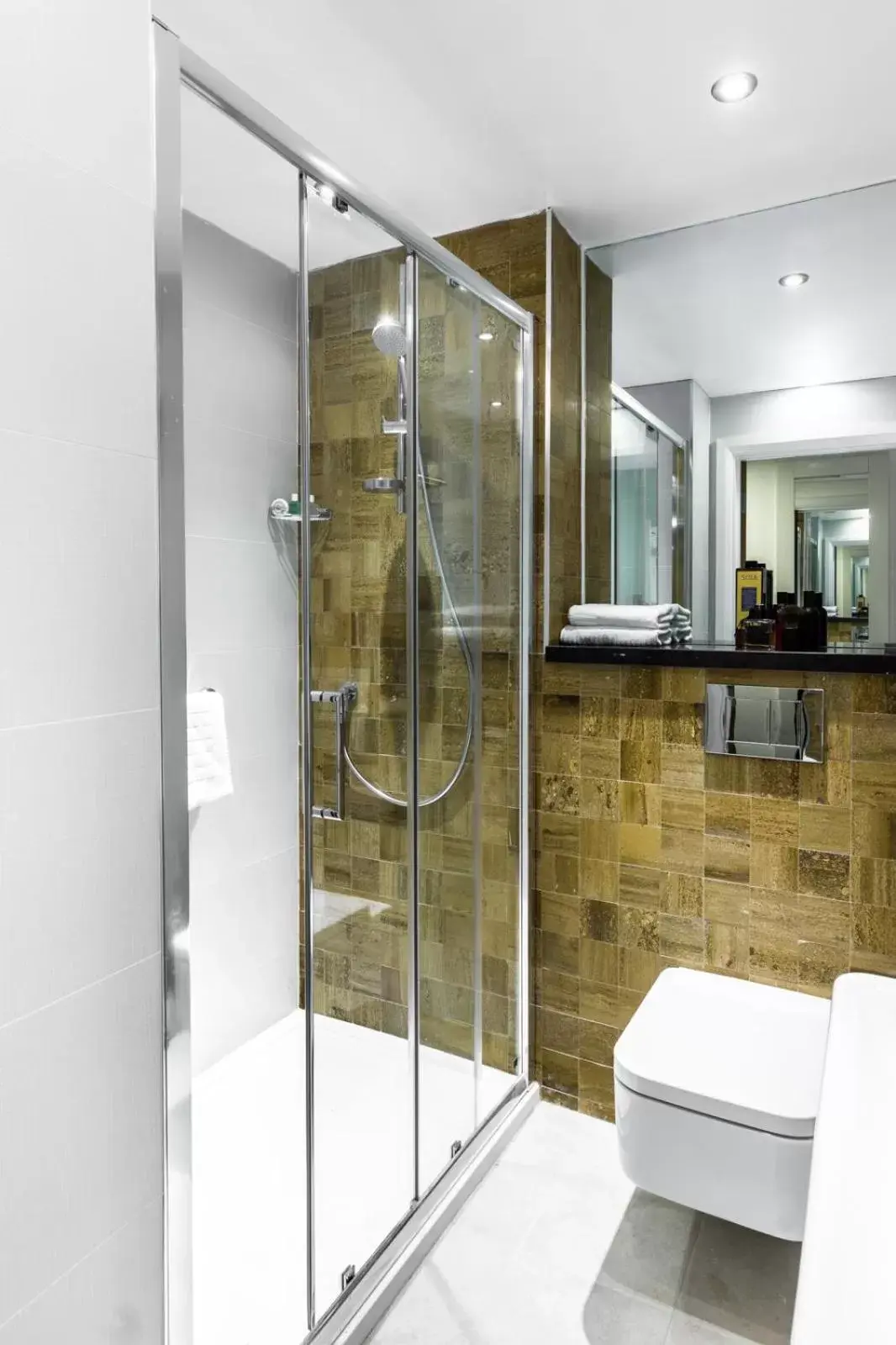 Shower, Bathroom in Holiday Inn London Watford Junction, an IHG Hotel