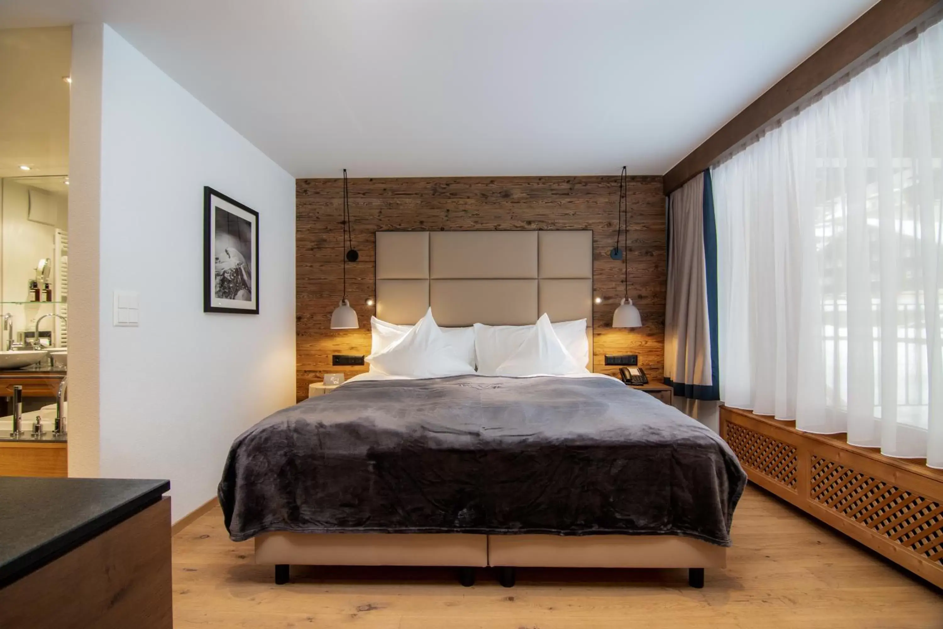 Bedroom, Bed in Walliserhof Grand-Hotel & Spa Relais & Châteaux
