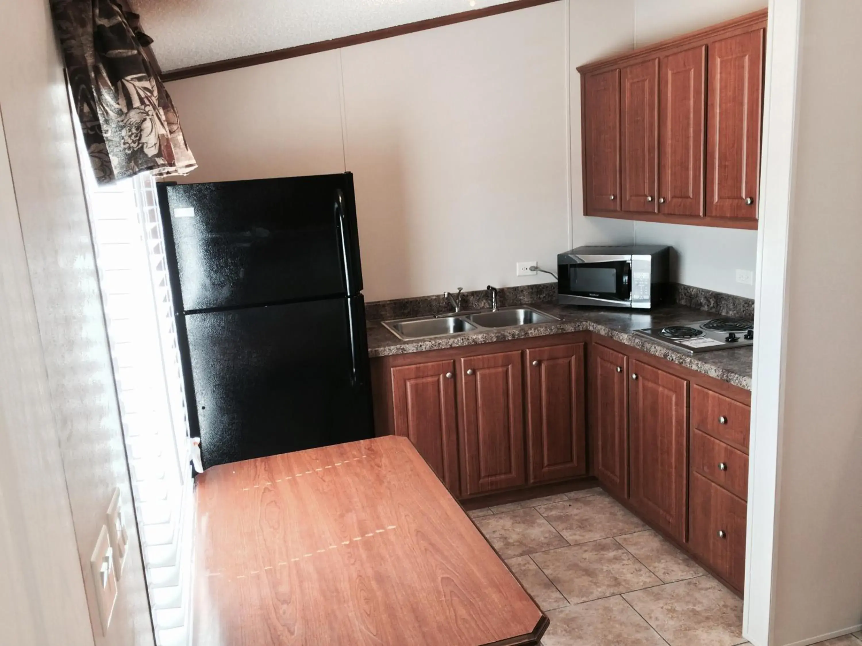 Kitchen or kitchenette, Kitchen/Kitchenette in Oasis Lodge