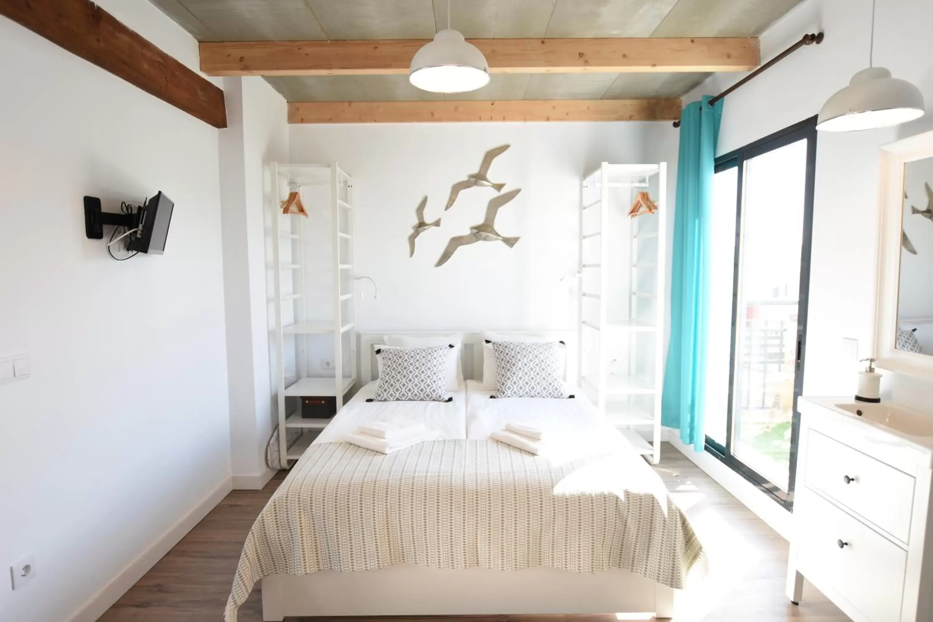 Bed in Apartamentos de la Huerta