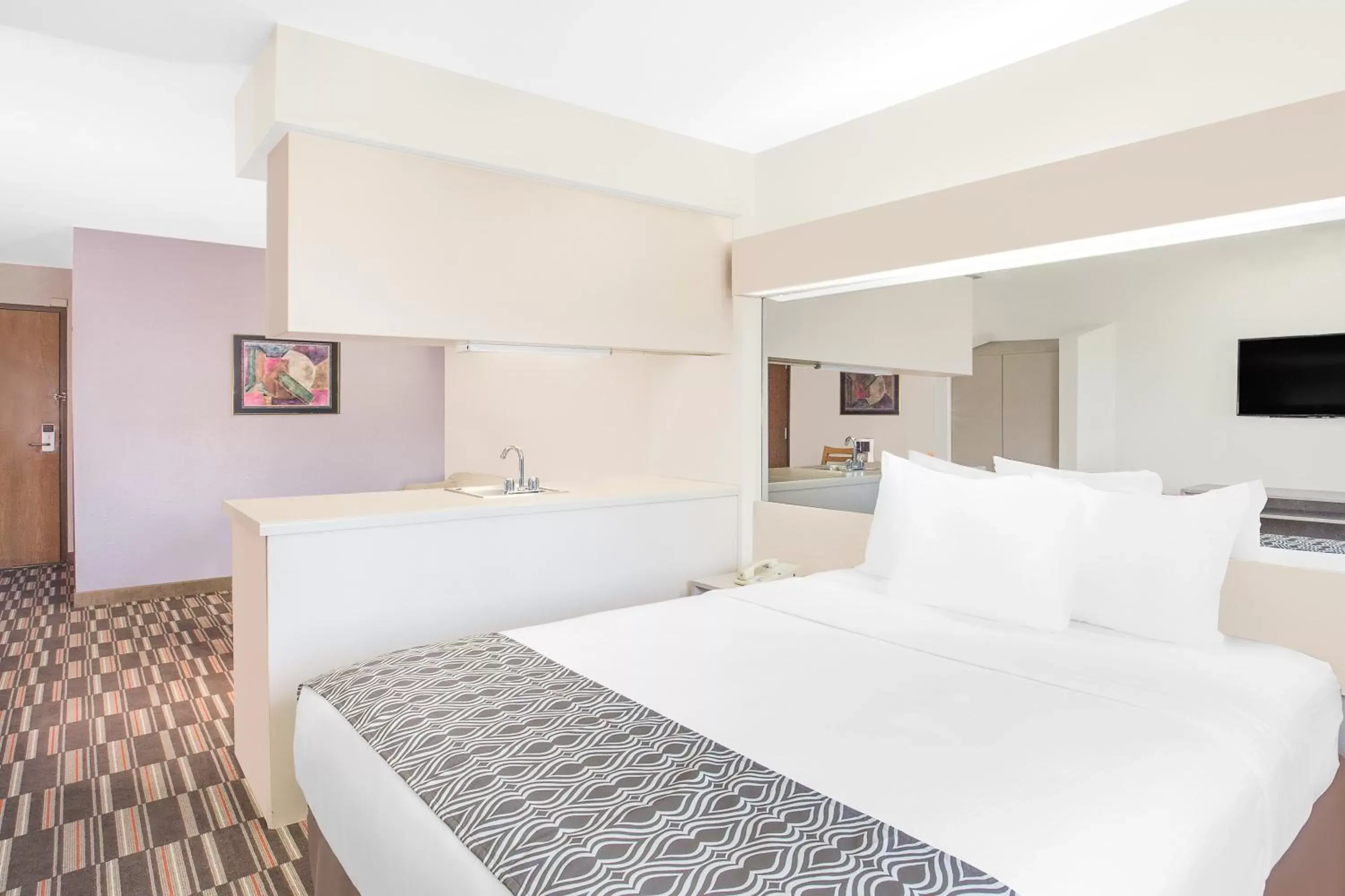 Bed in Microtel Inn and Suites by Wyndham Appleton Bed in Microtel Inn and Suites by Wyndham Appleton