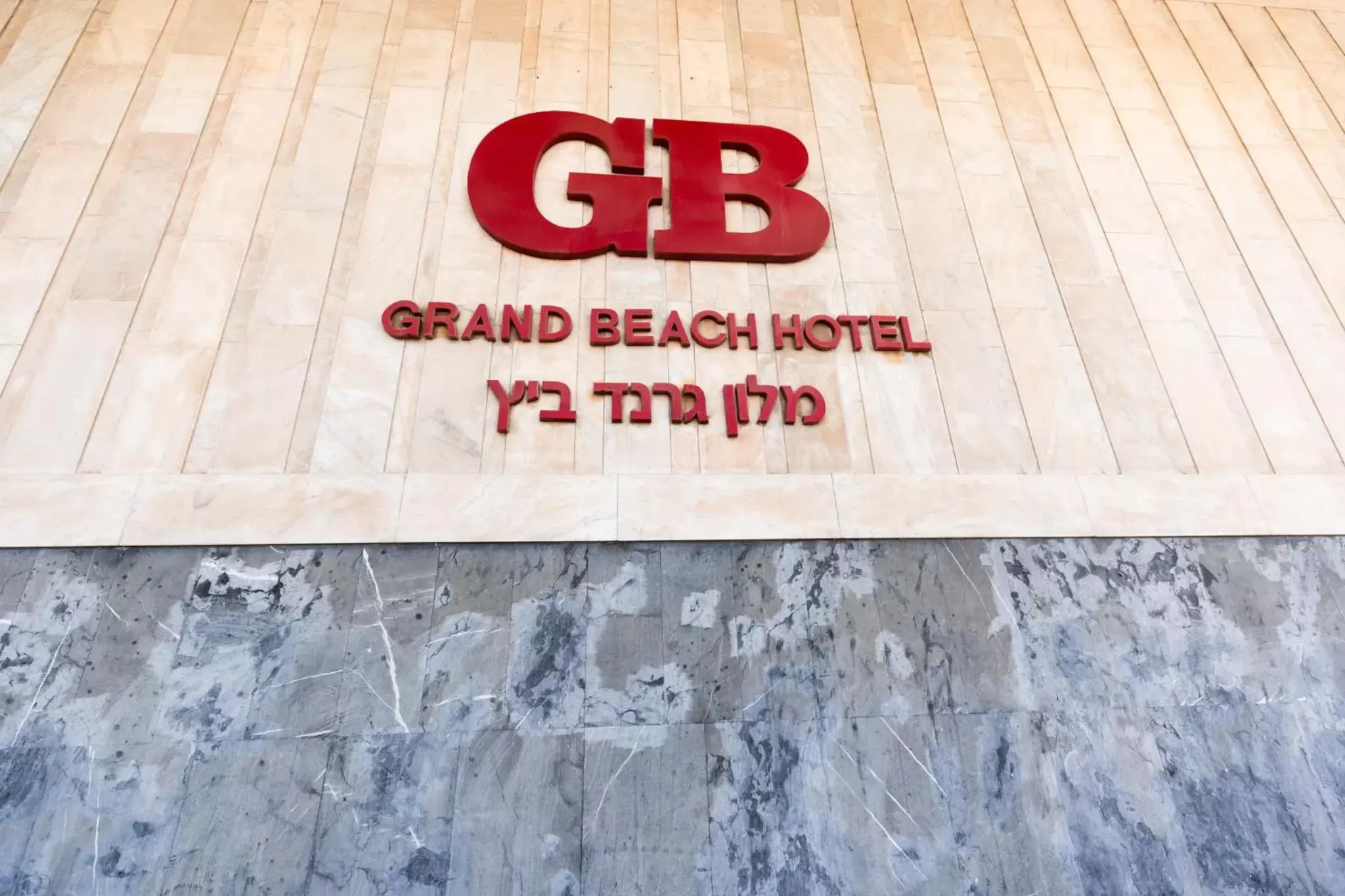 Property logo or sign in Grand Beach Hotel