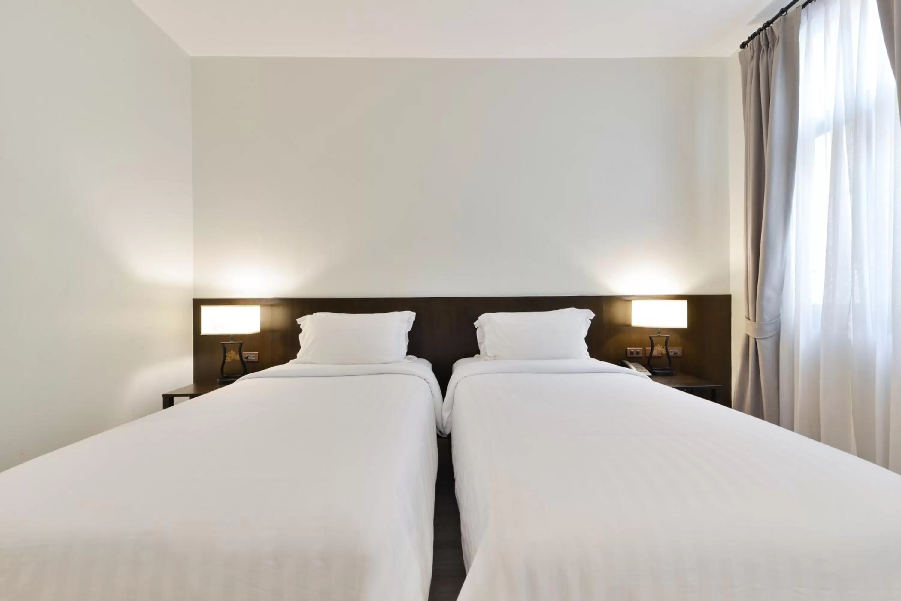 Bed in Oldthaiheng Hotel