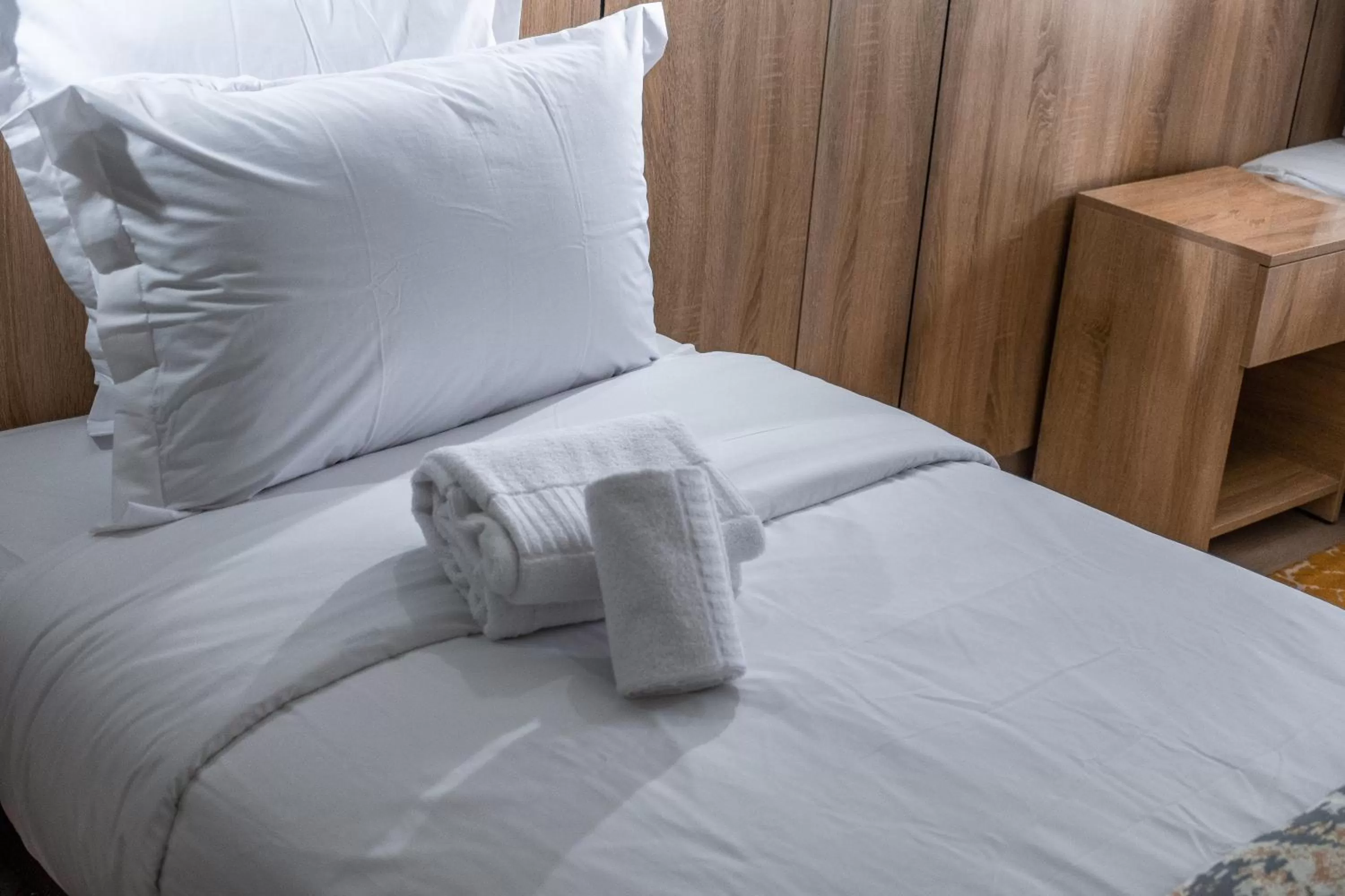 Bed in Karam City Hotel