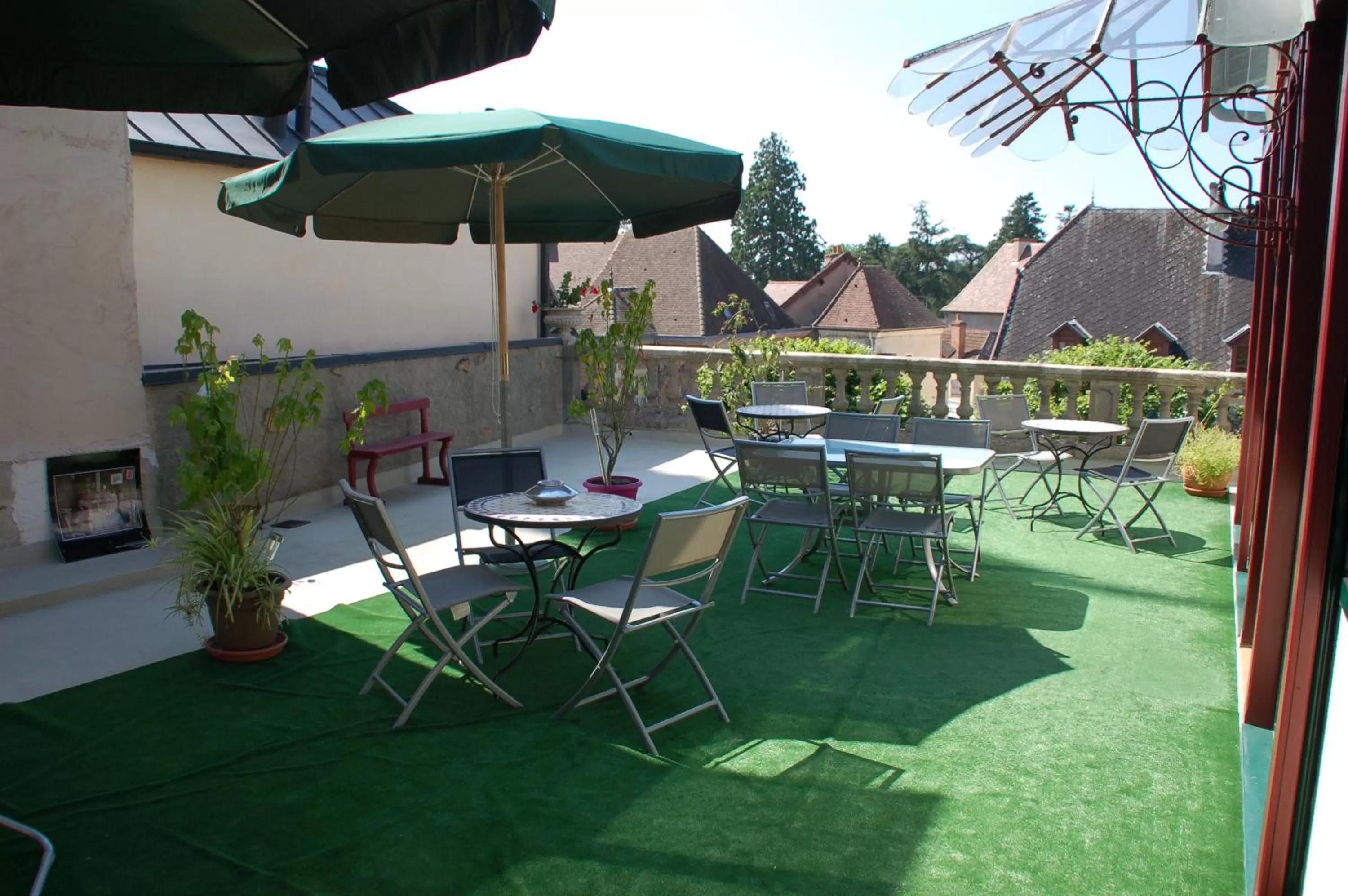 Seating area in Logis Hotel La Tourelle du Beffroi