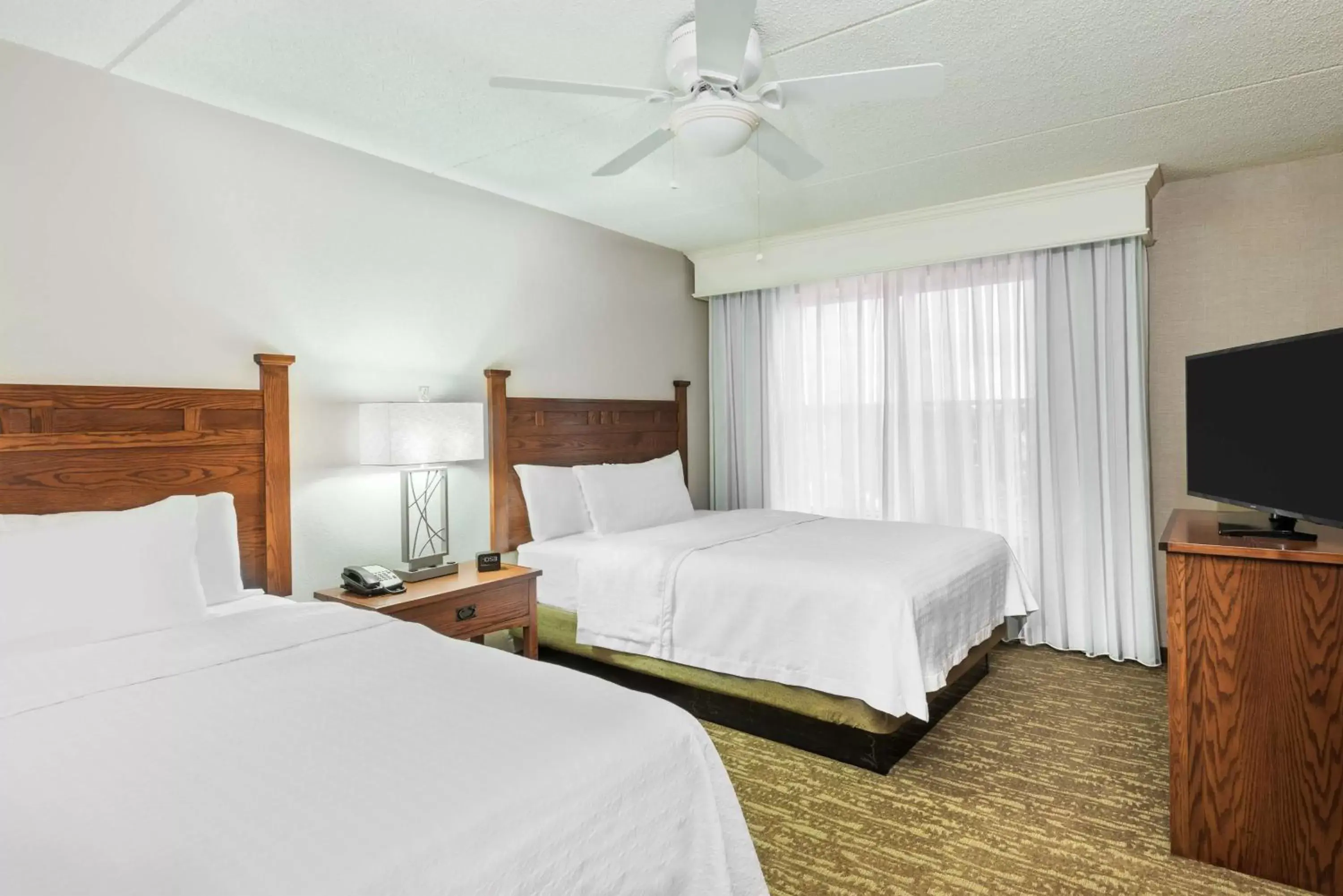 Bed in Homewood Suites by Hilton Buffalo-Amherst