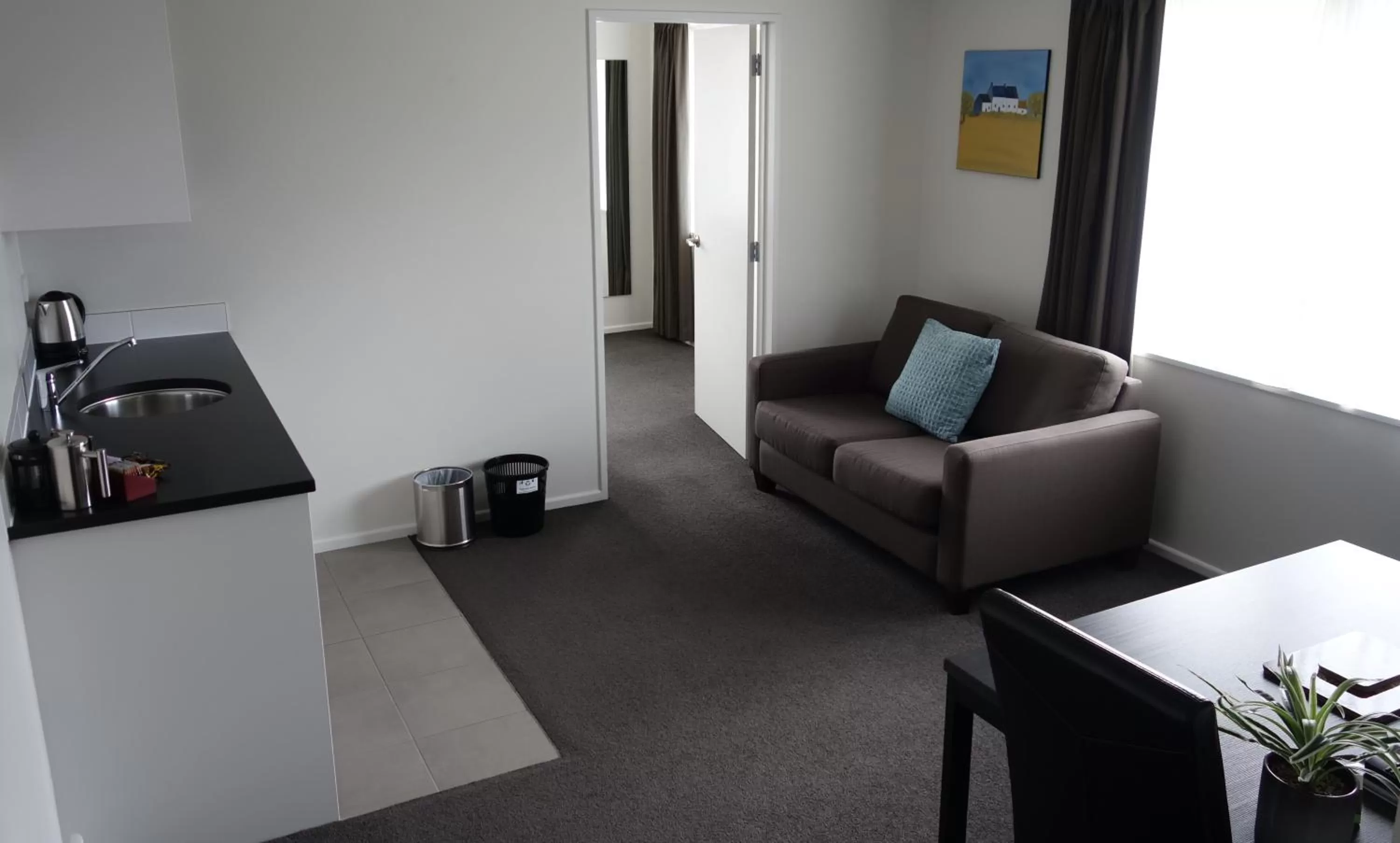 Living room in Airport Palms Motel