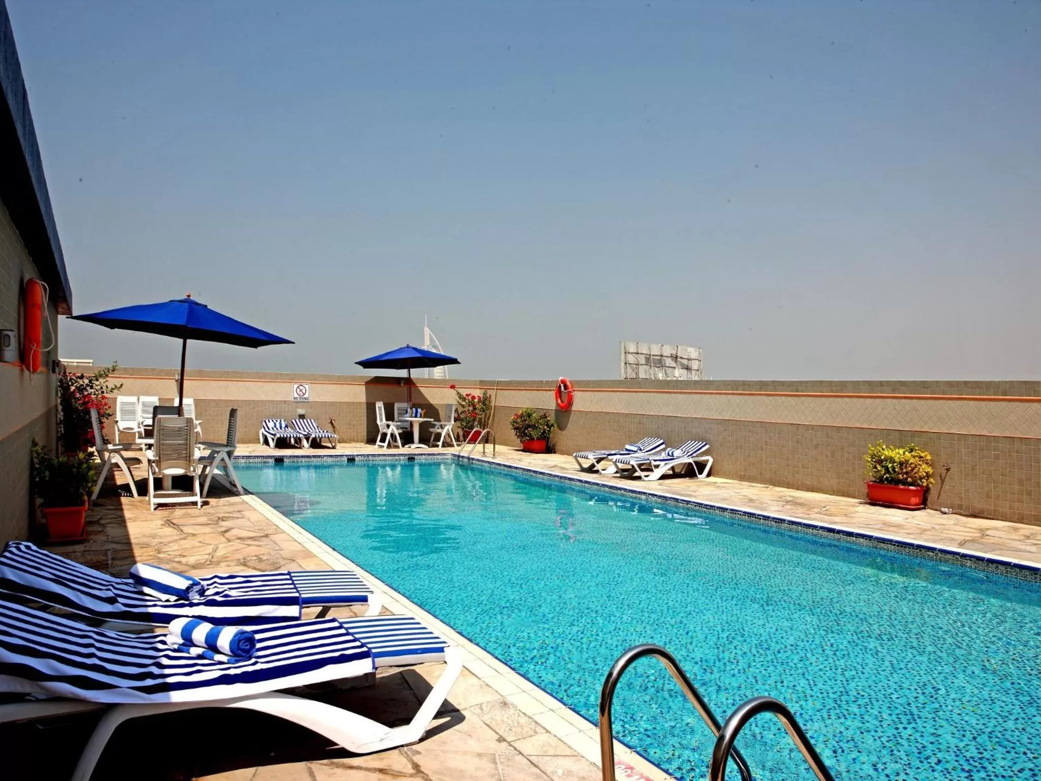 Swimming pool in Rose Garden Hotel Apartments - Al Barsha, Near Metro Station