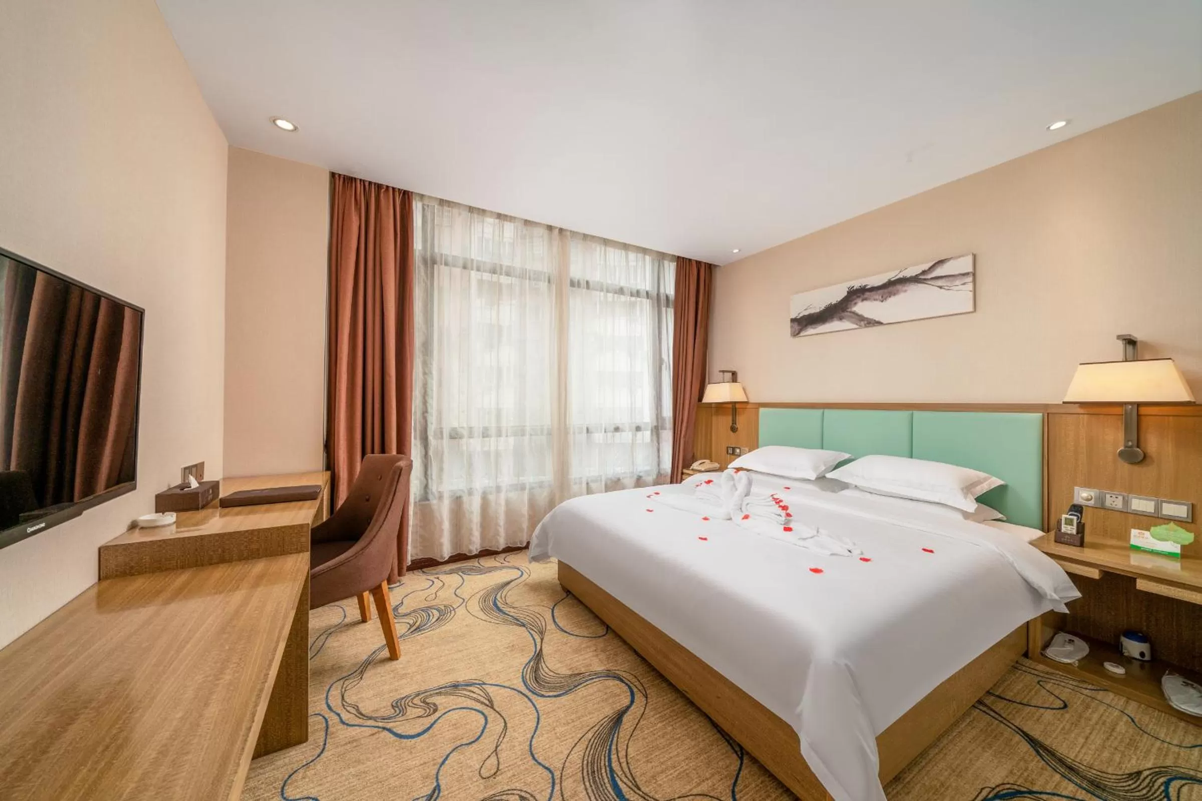 Bed in Guangzhou Boyi Hotel