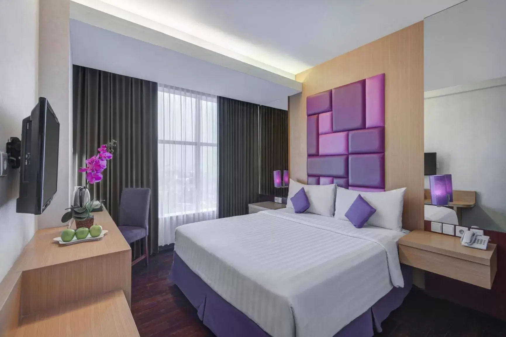 Bedroom, Bed in Quest Hotel Darmo - Surabaya by ASTON