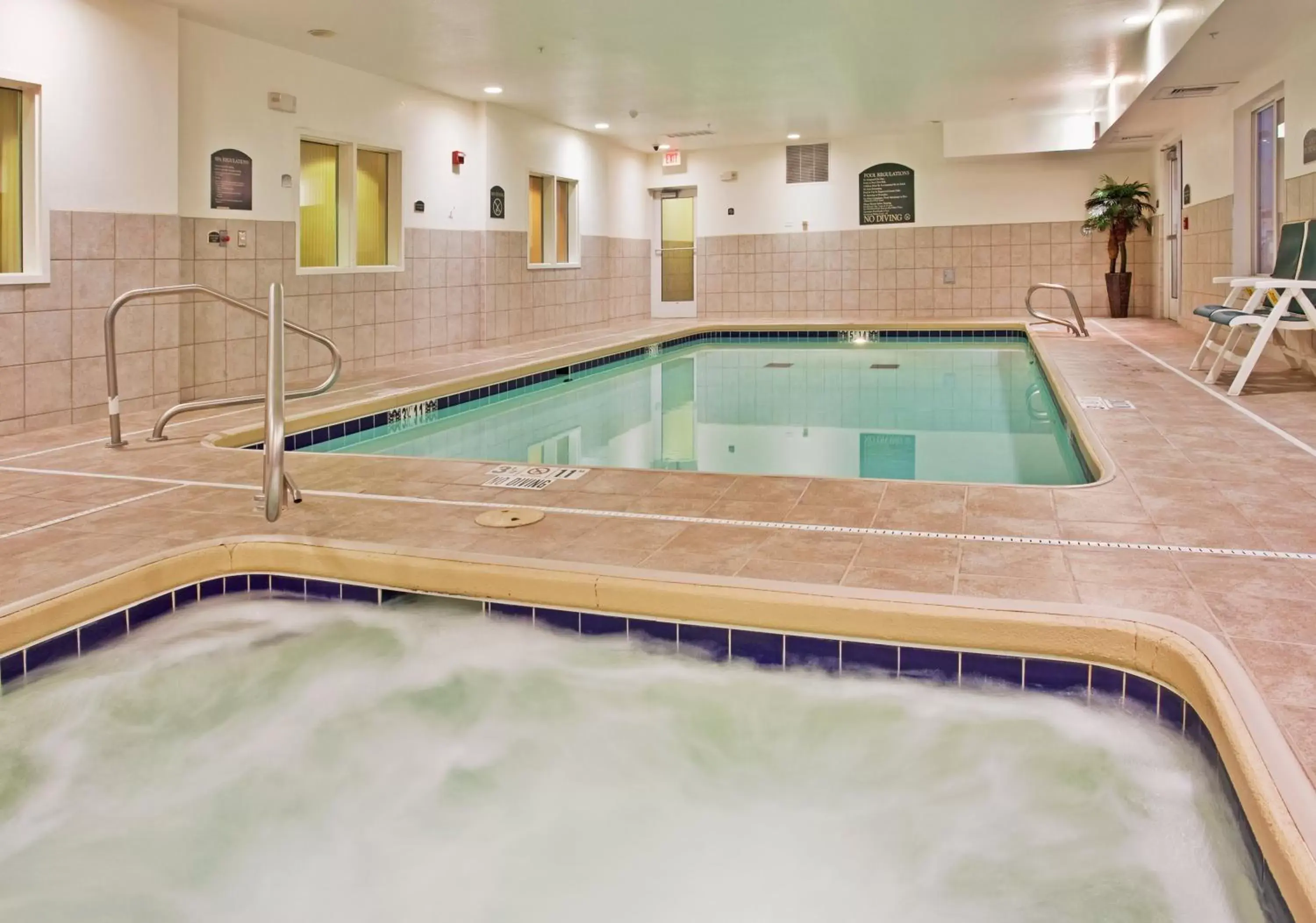 Swimming Pool in Holiday Inn Express Hotel & Suites Wichita Airport, an IHG Hotel