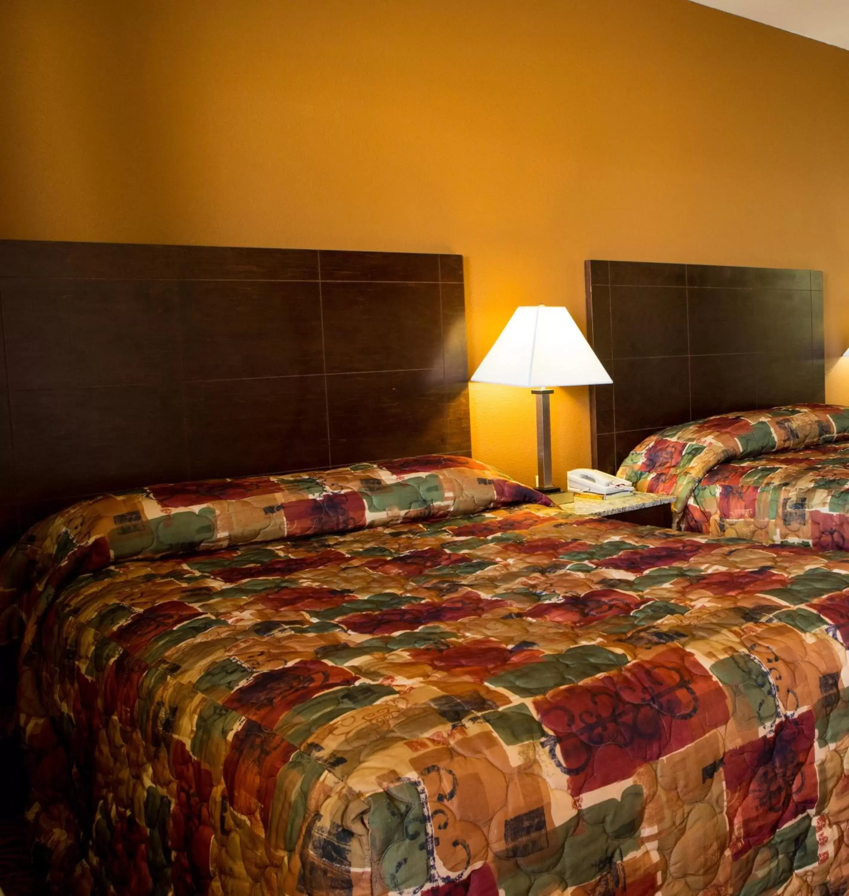 Bed in Sands Inn & Suites