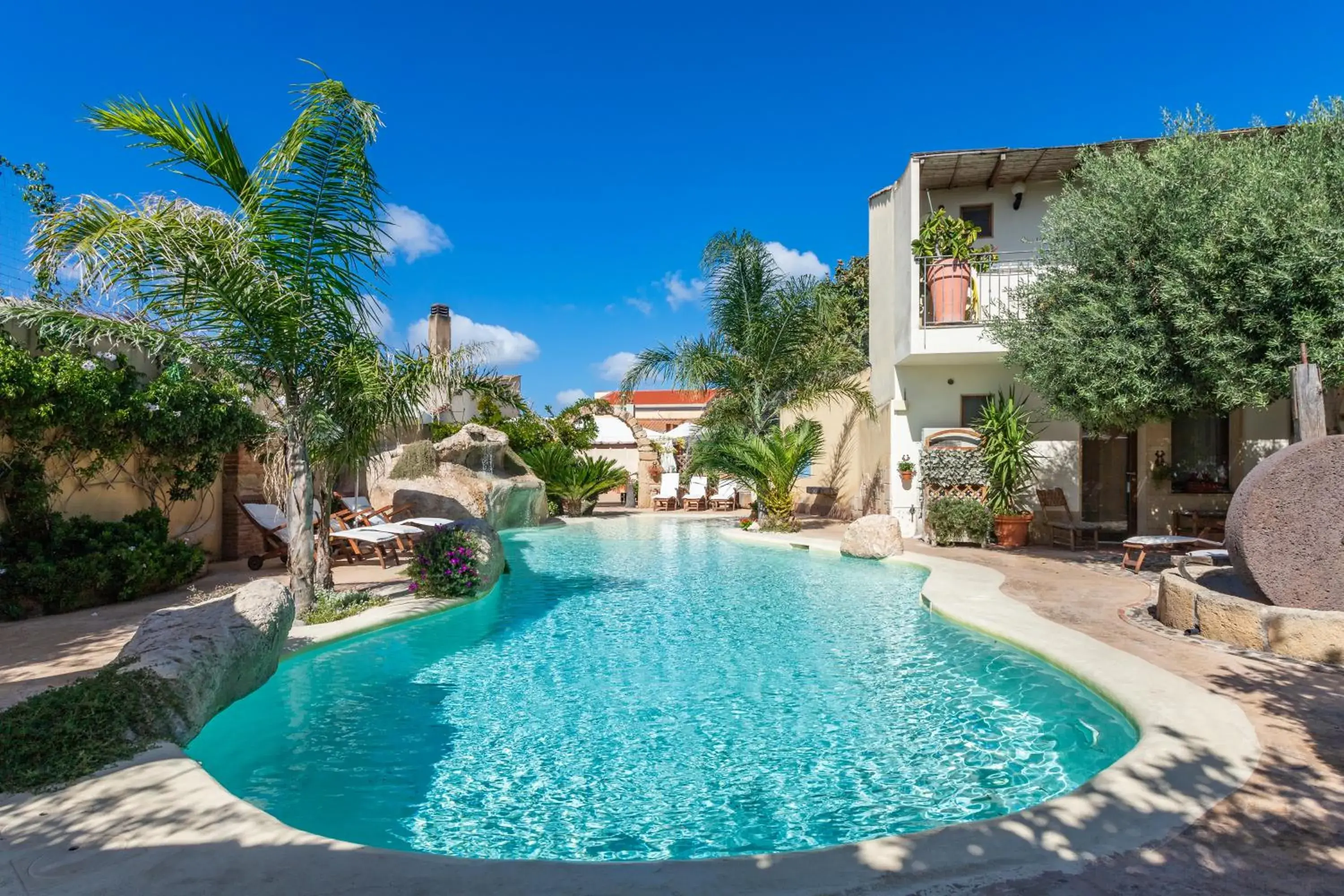Patio, Swimming Pool in Hotel Villa Canu