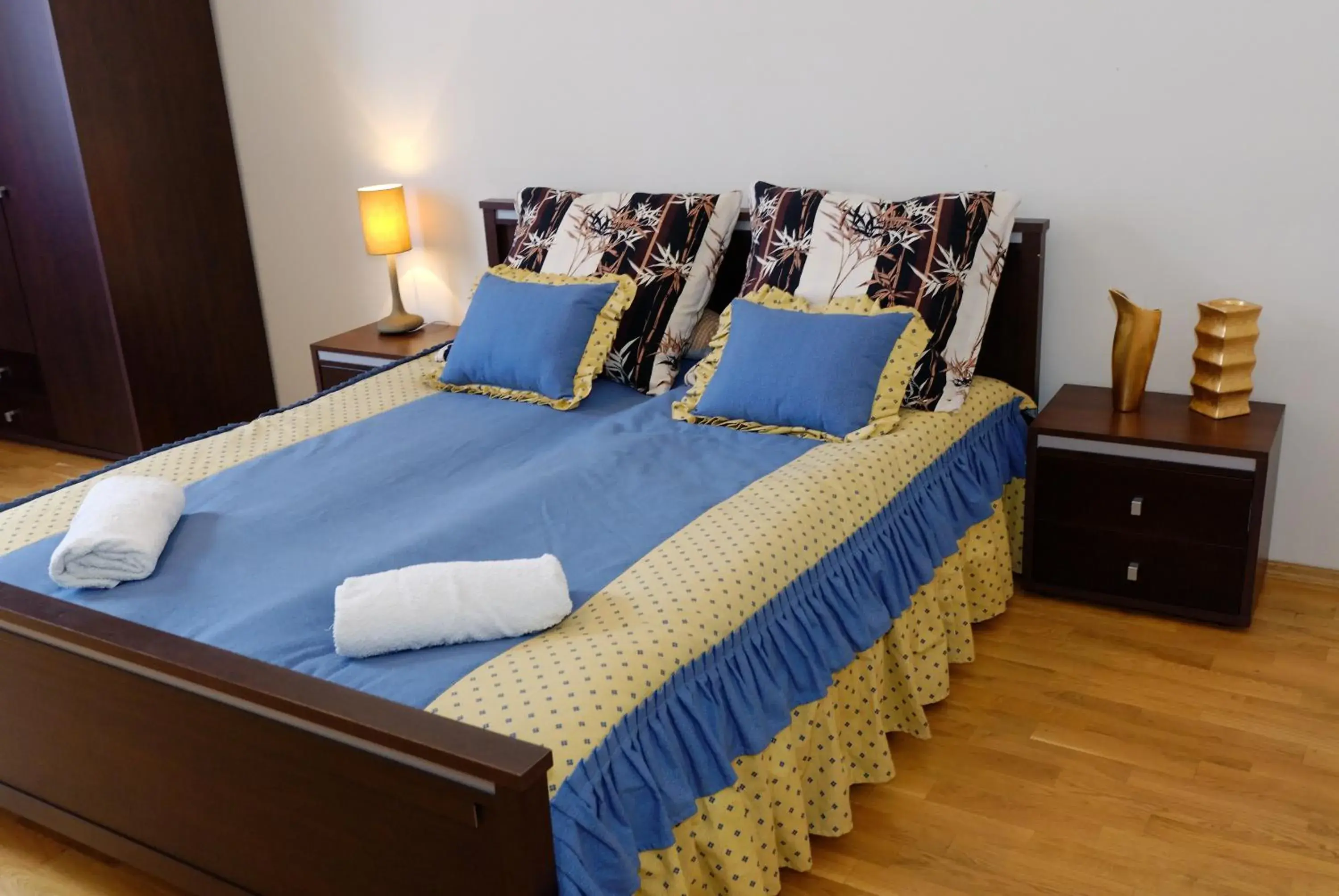 Bed in P&J Tourist Apartments