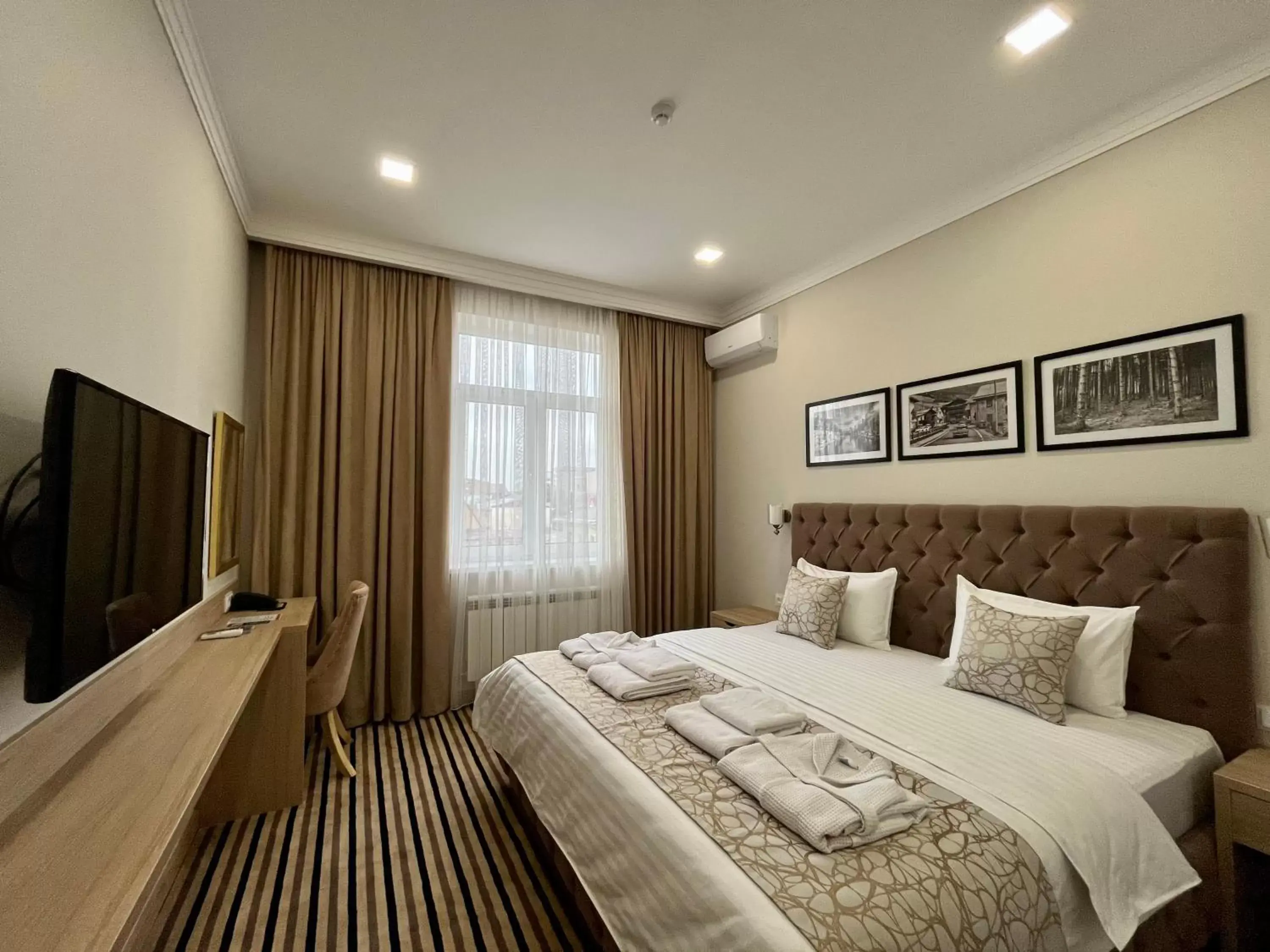 Photo of the whole room, Bed in Bristol Hotel Tashkent Photo of the whole room, Bed in Bristol Hotel Tashkent