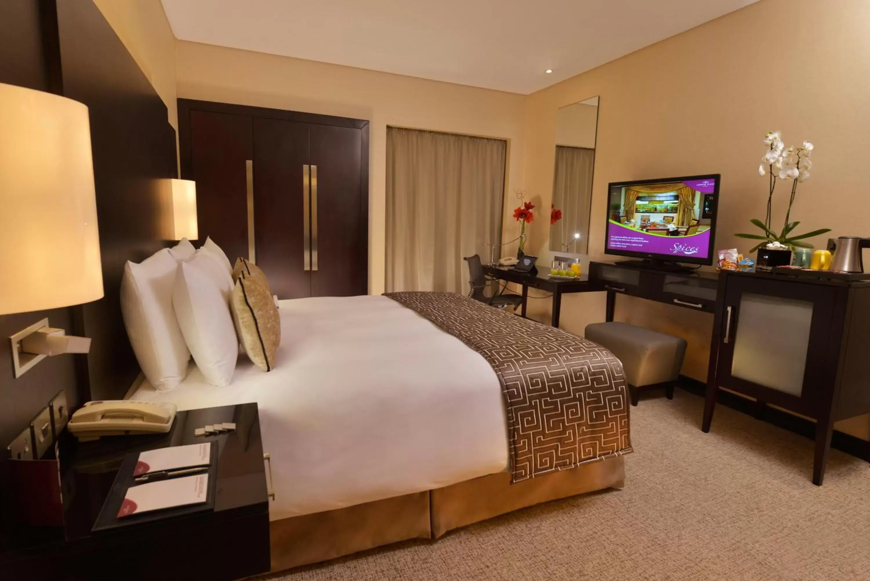 Photo of the whole room, TV/Entertainment Center in Crowne Plaza Bahrain, an IHG Hotel