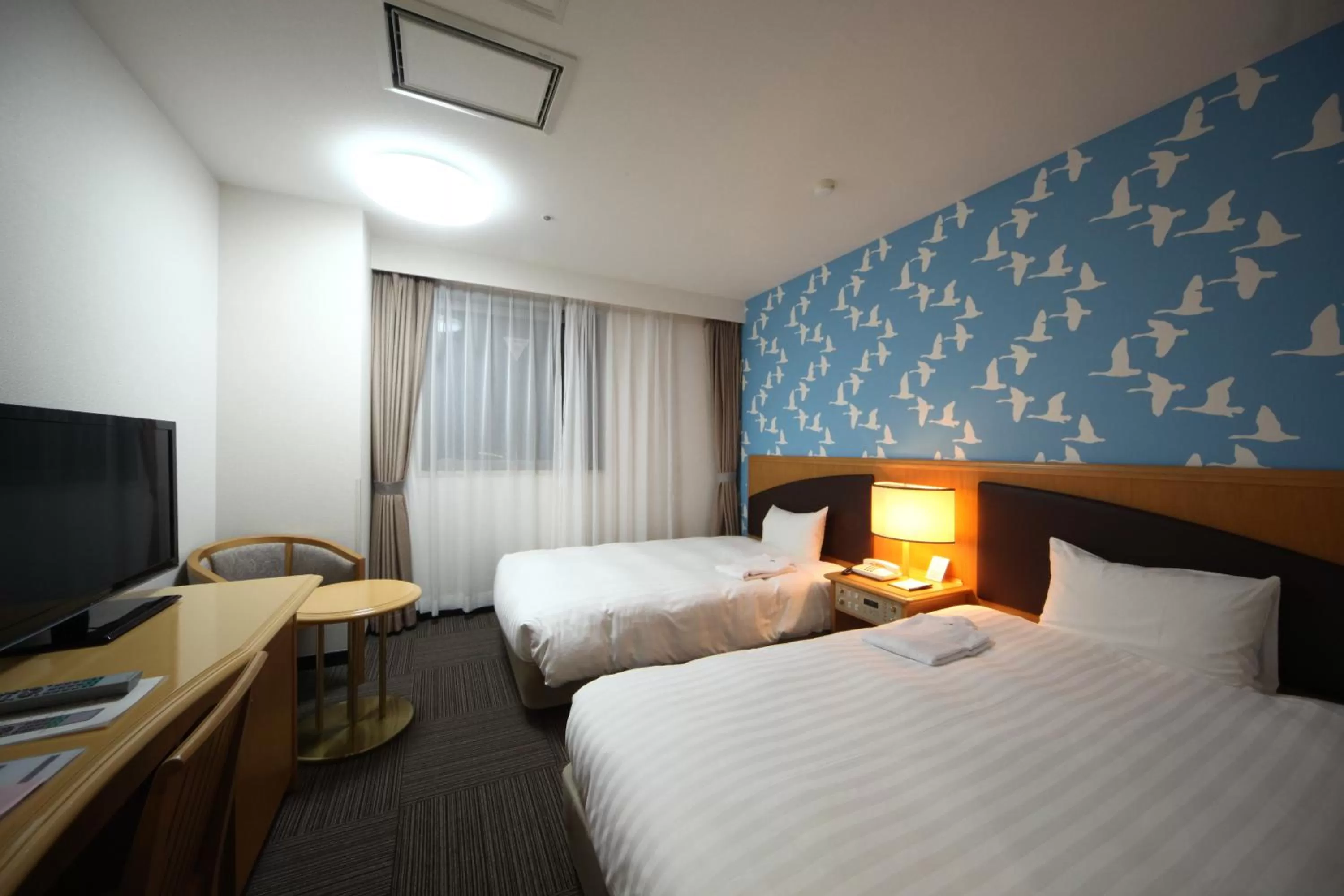 Photo of the whole room, Bed in Hotel Wing International Tomakomai