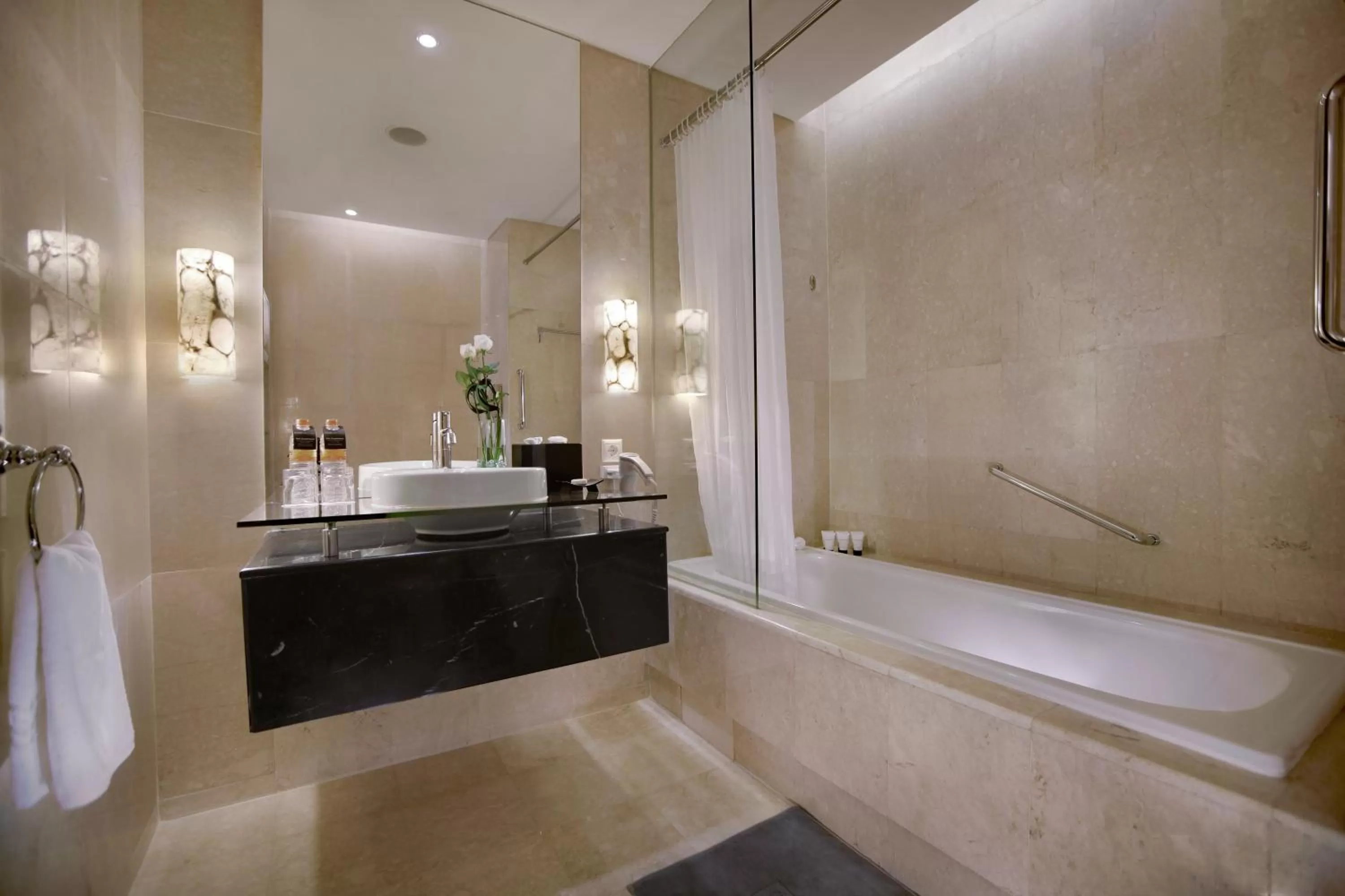 Bathroom in The Grove Suites by Grand Aston