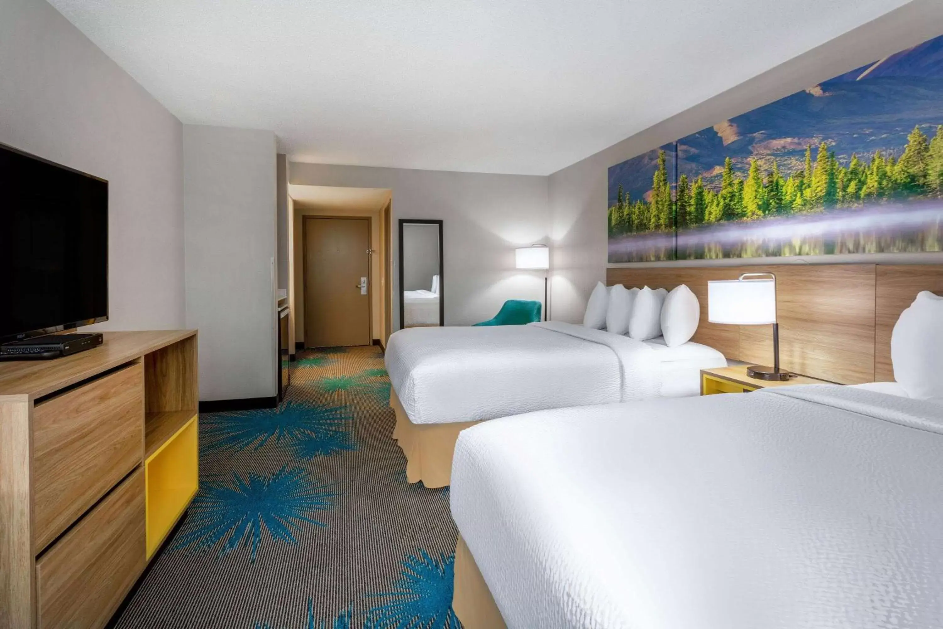 Photo of the whole room, Bed in Days Inn & Suites by Wyndham Denver International Airport