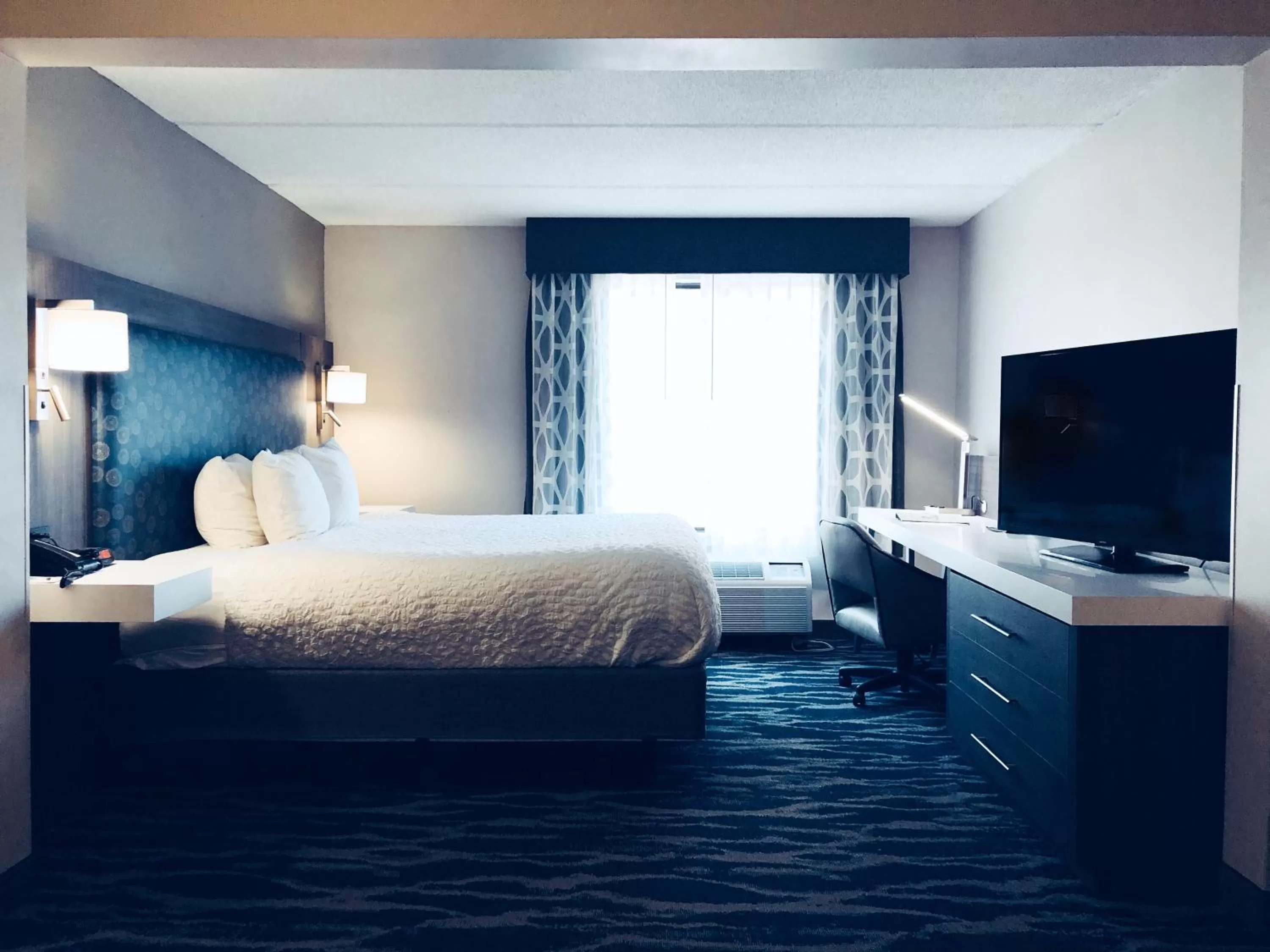 Bed in Comfort Inn & Suites Greenville Near East Carolina University