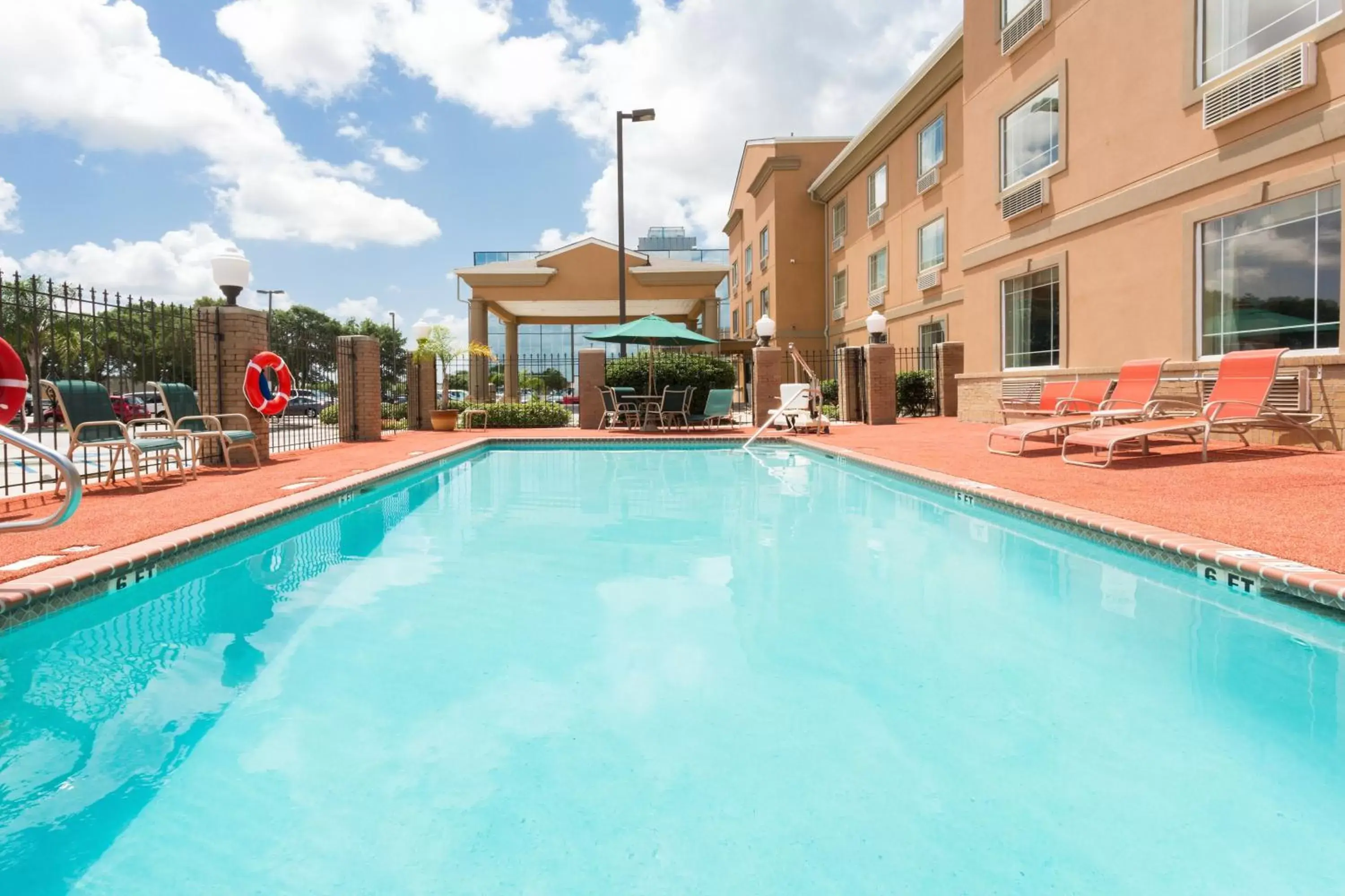Swimming Pool in Holiday Inn Express Harvey-Marrero, an IHG Hotel