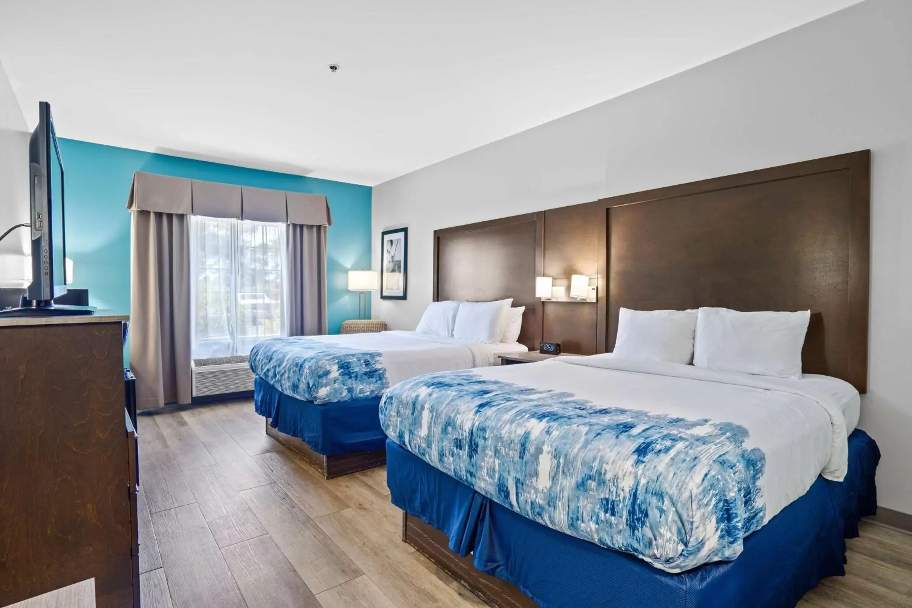 Bedroom, Bed in Blue Water Inn & Suites BW Signature Collection