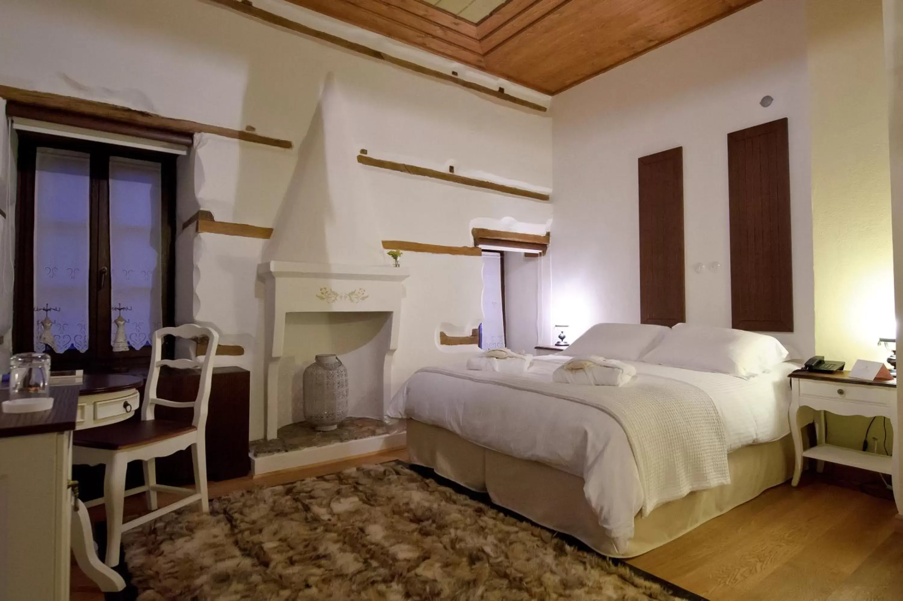 Bed in Orologopoulos Mansion Luxury Hotel