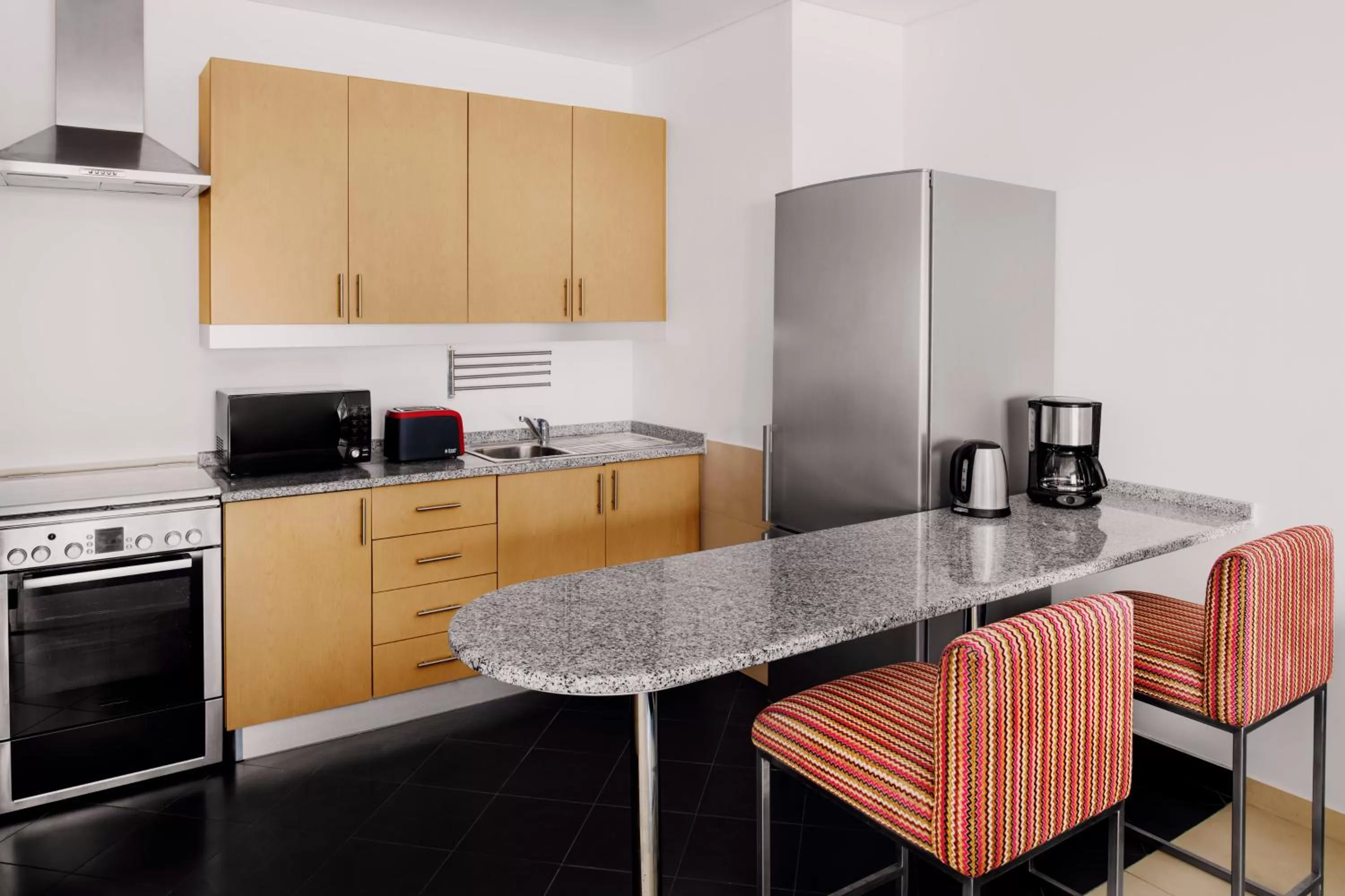 kitchen in Adagio Premium Dubai Al Barsha