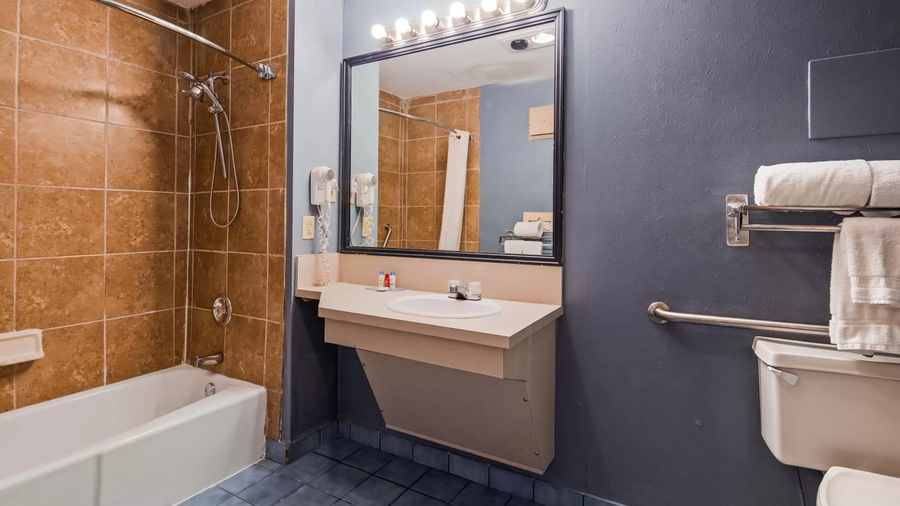 Bathroom in SureStay Plus Hotel by Best Western Fayetteville