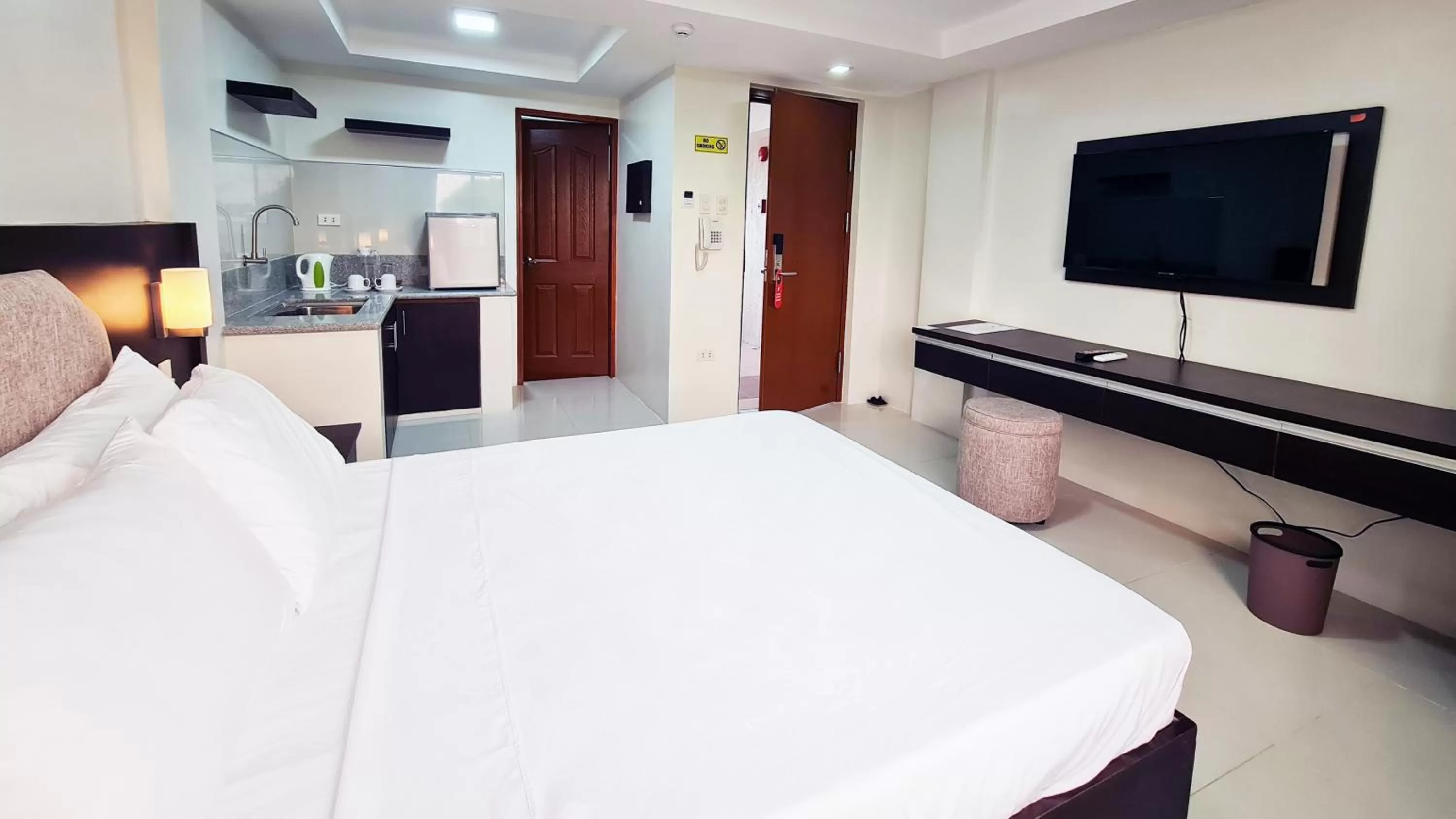 Bed in Staycation Hotel