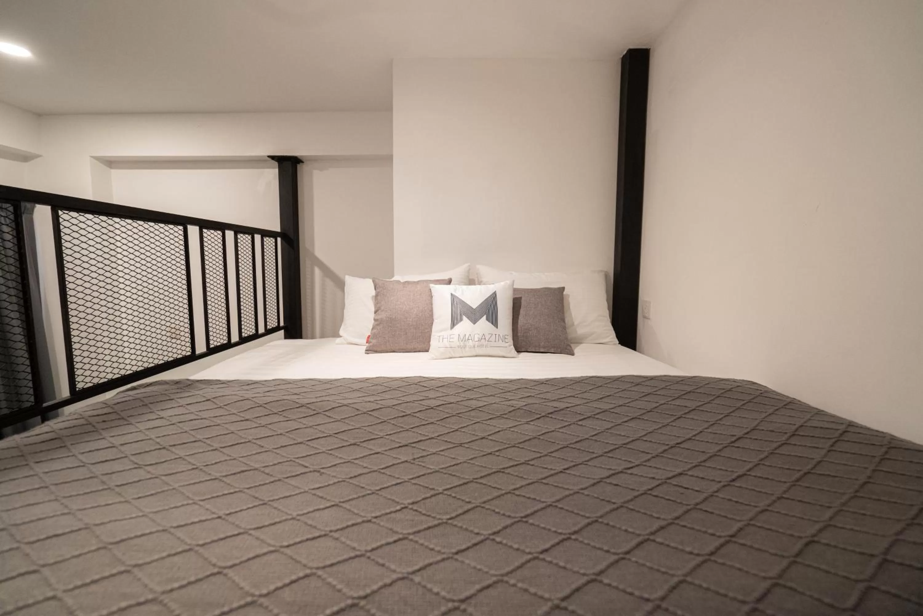 Bed in The Magazine Boutique Hotel