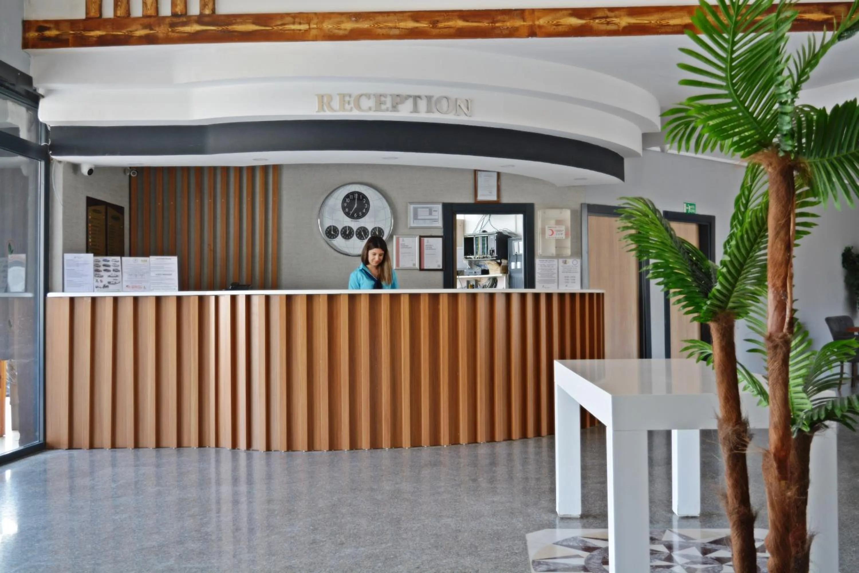 Staff in Clover Magic Park Side Hotel