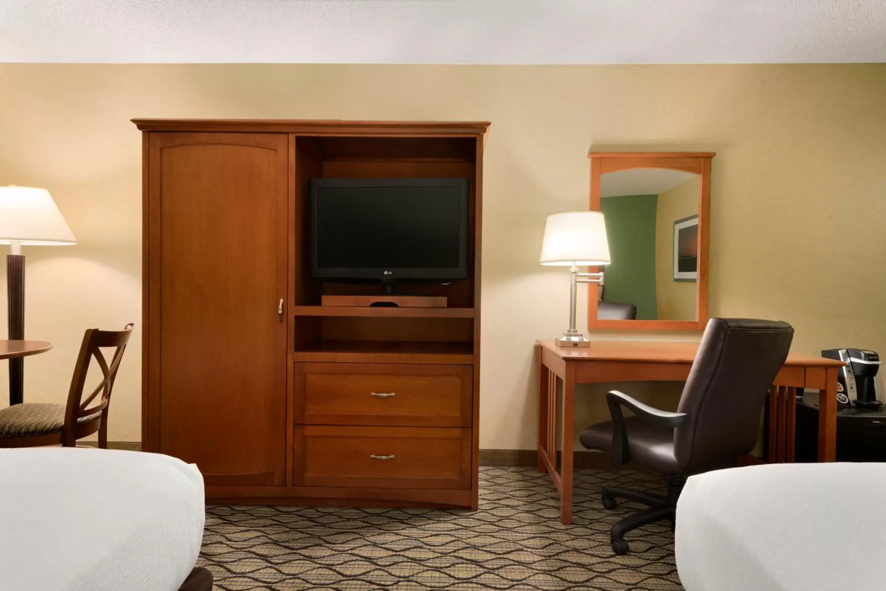 Photo of the whole room, TV/Entertainment Center in Holiday Inn & Suites Duluth-Downtown, an IHG Hotel