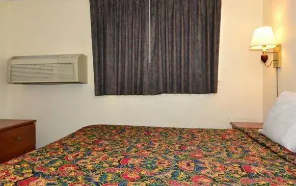 Bed in Days Inn by Wyndham Ontario Airport