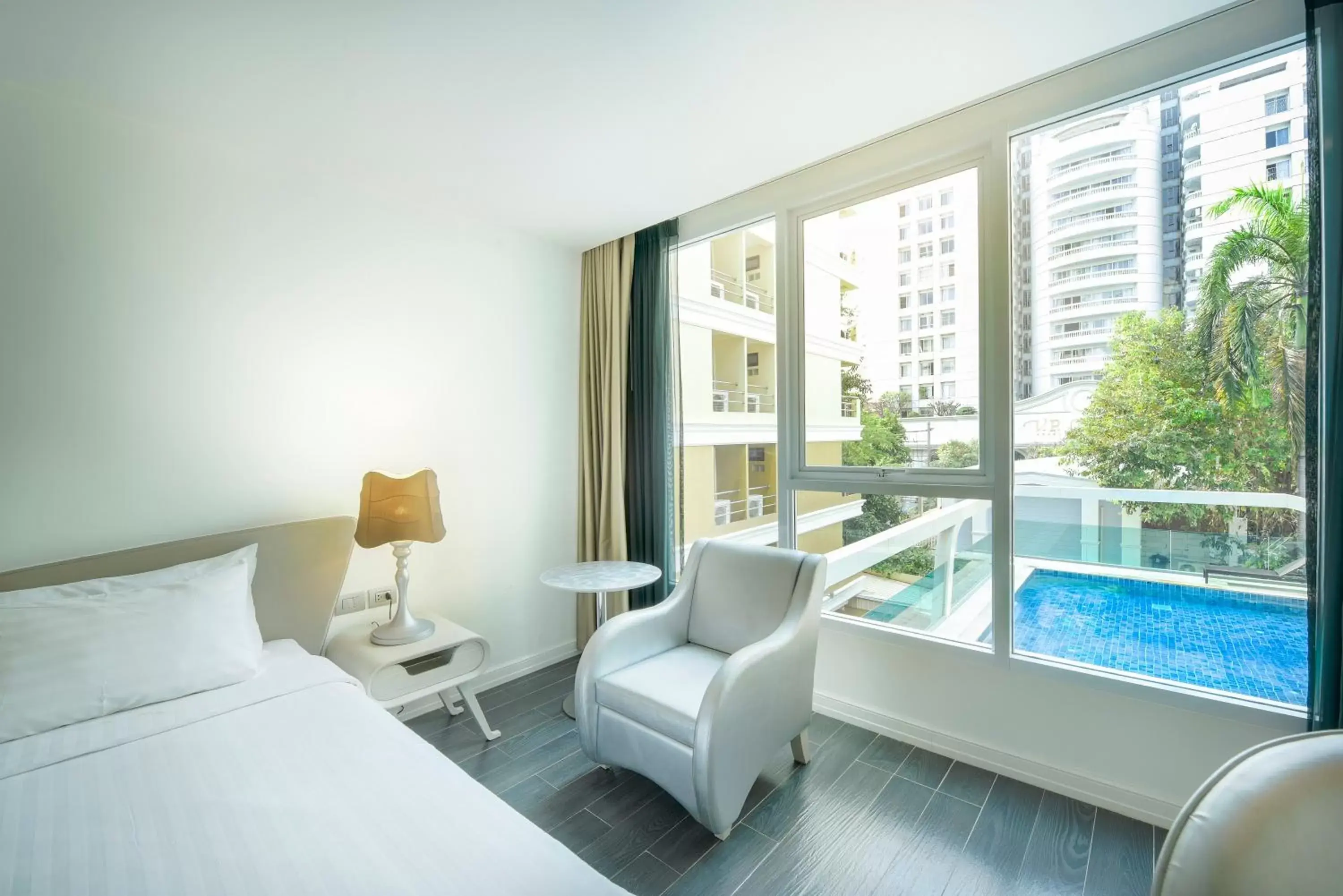 Bedroom, Pool View in Le Tada Parkview Hotel - SHA Plus