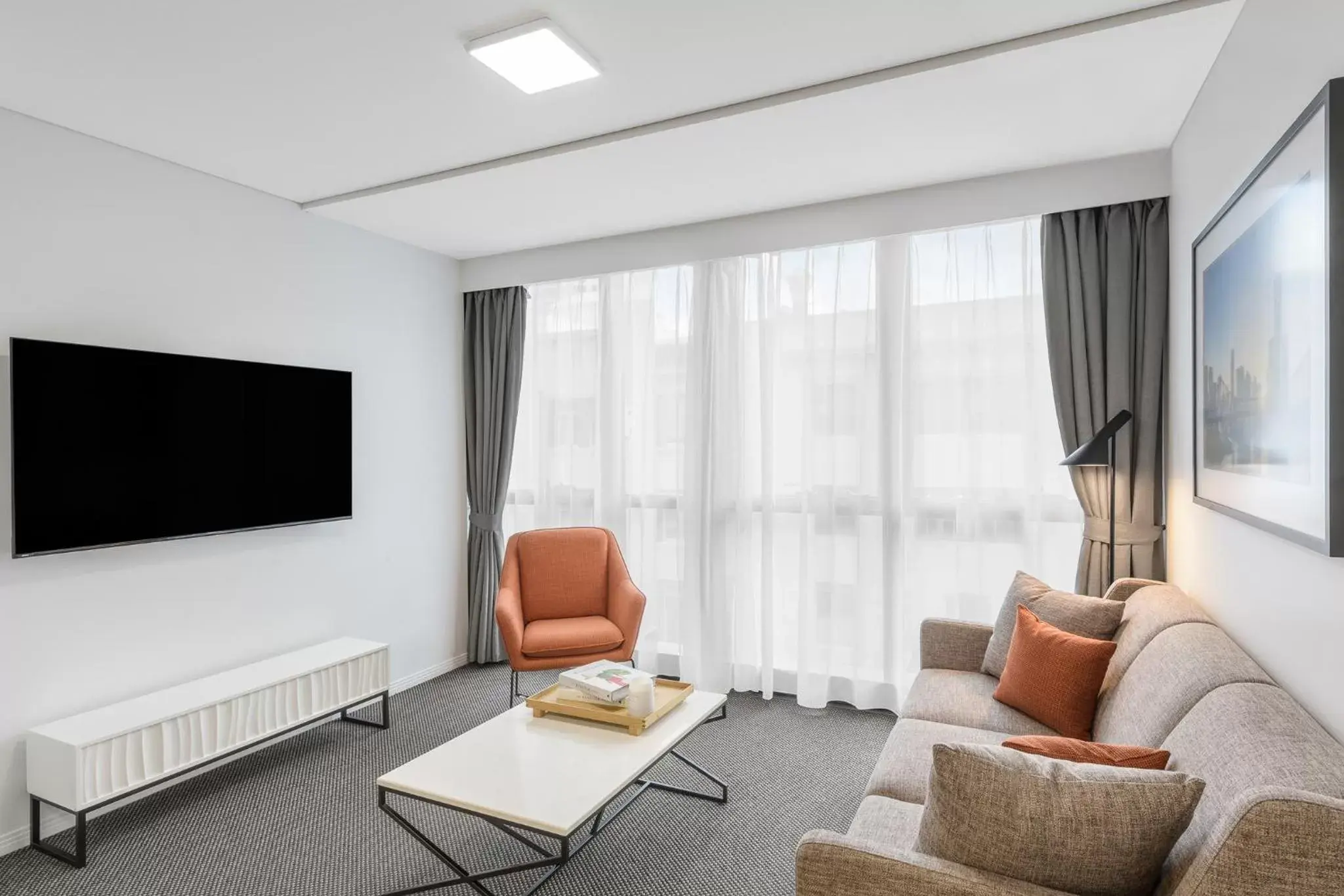 TV and multimedia, Seating Area in Meriton Suites Adelaide Street, Brisbane