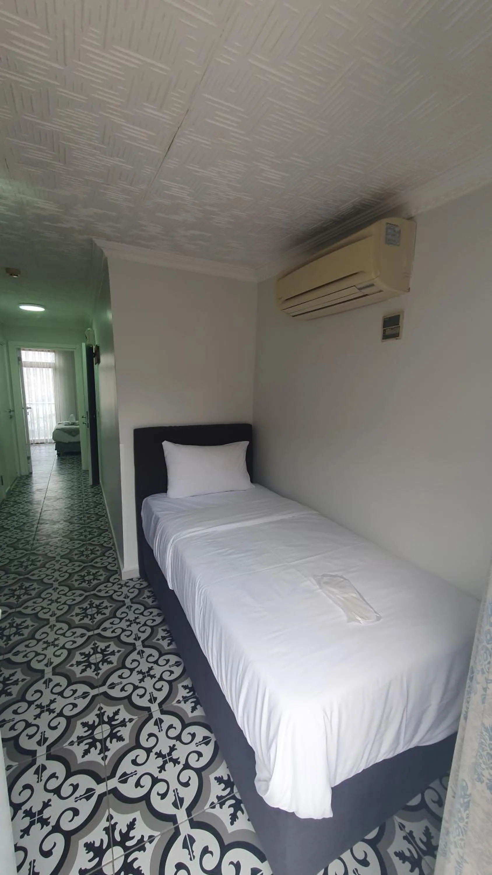 Bed in Lemon Residence