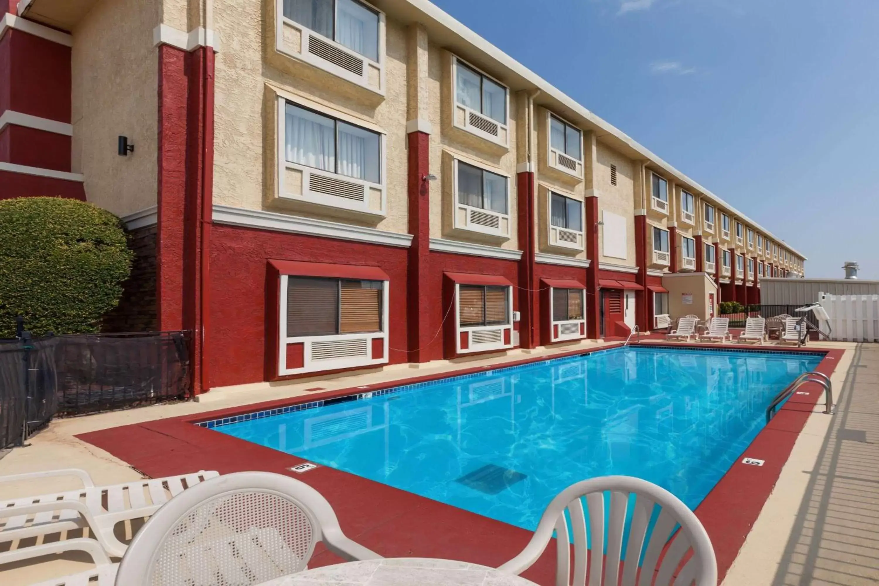 Pool view, Property Building in Ramada by Wyndham Oklahoma City Airport North