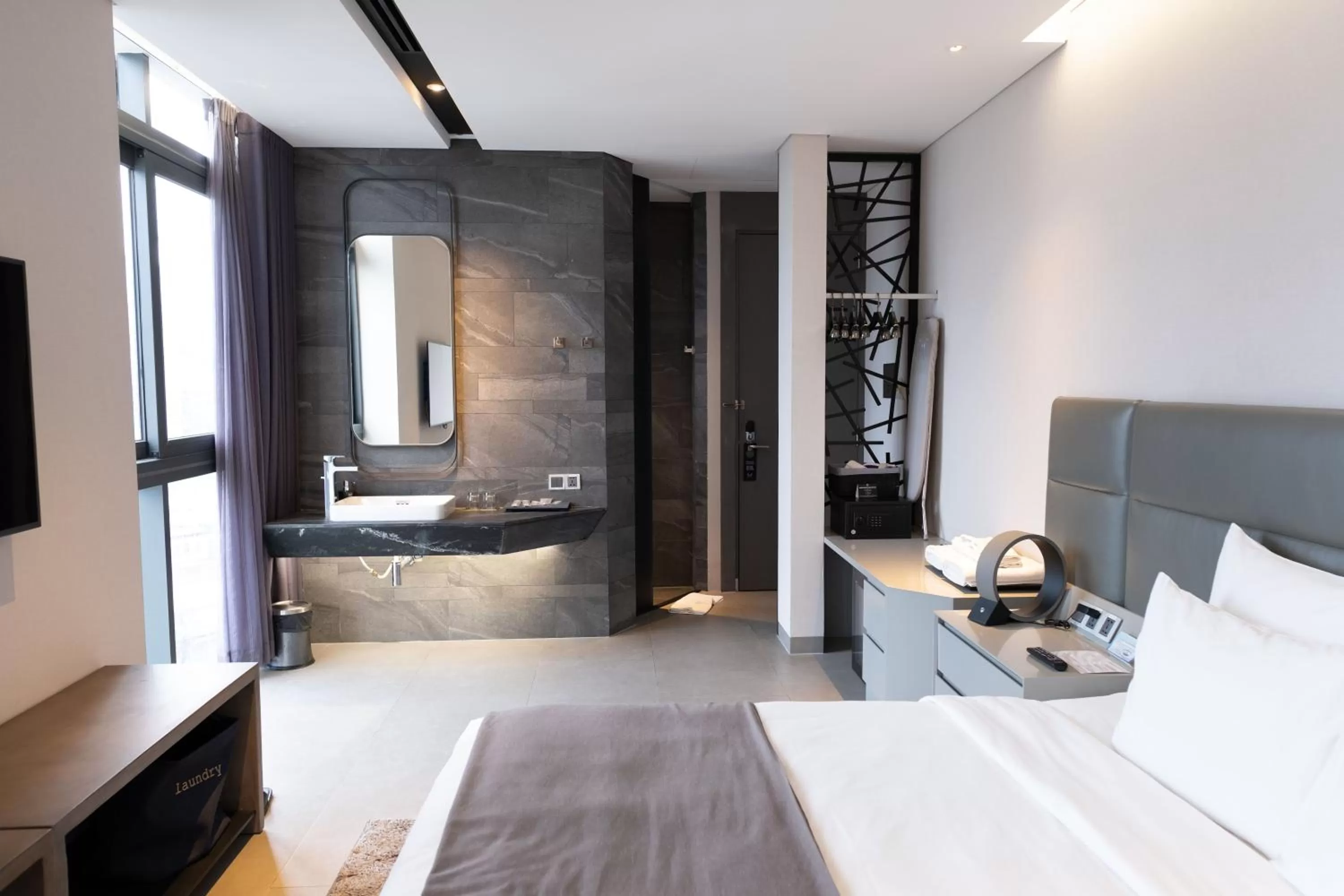 Bed in M Hotel Saigon