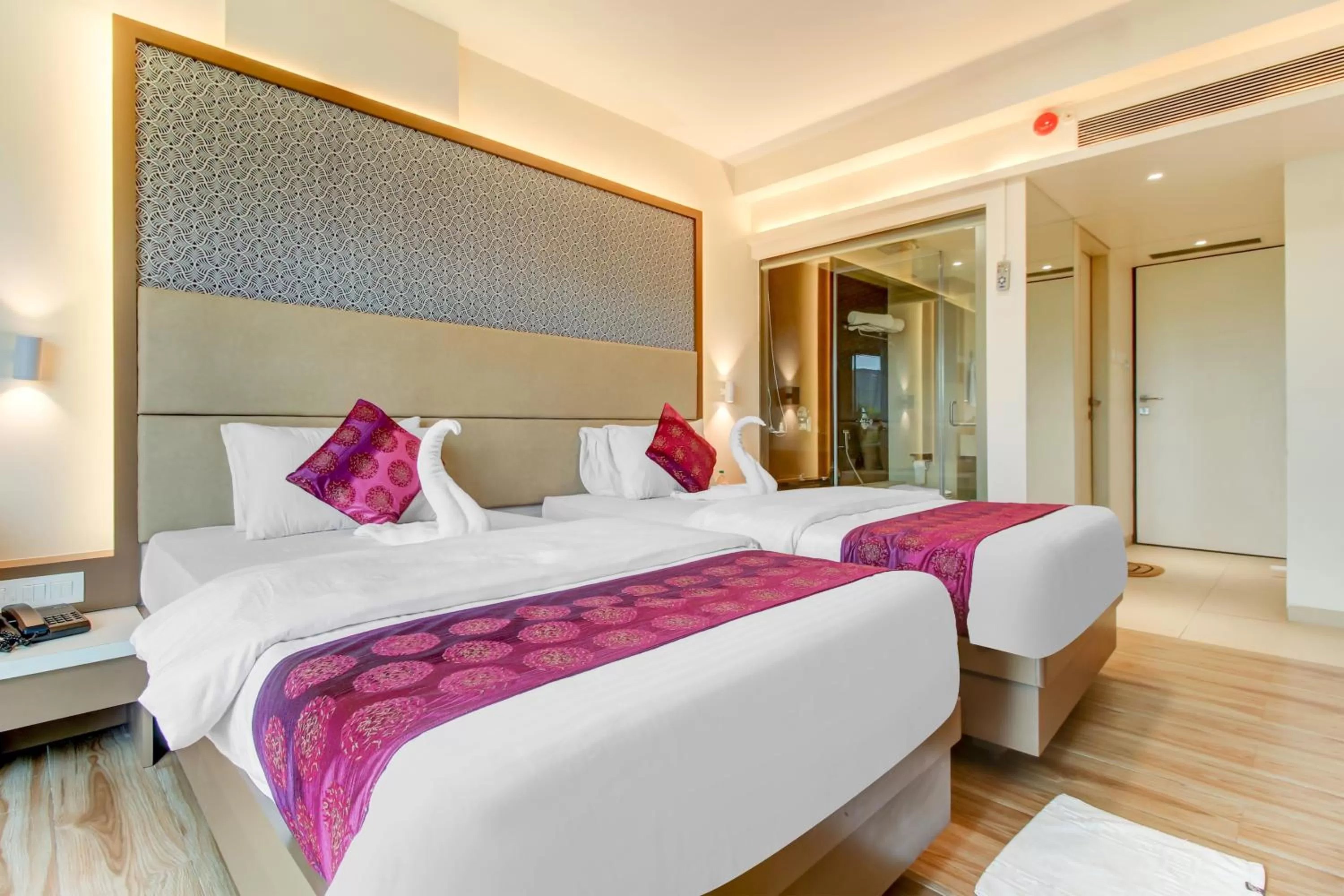 Photo of the whole room, Bed in Grand Mookambika